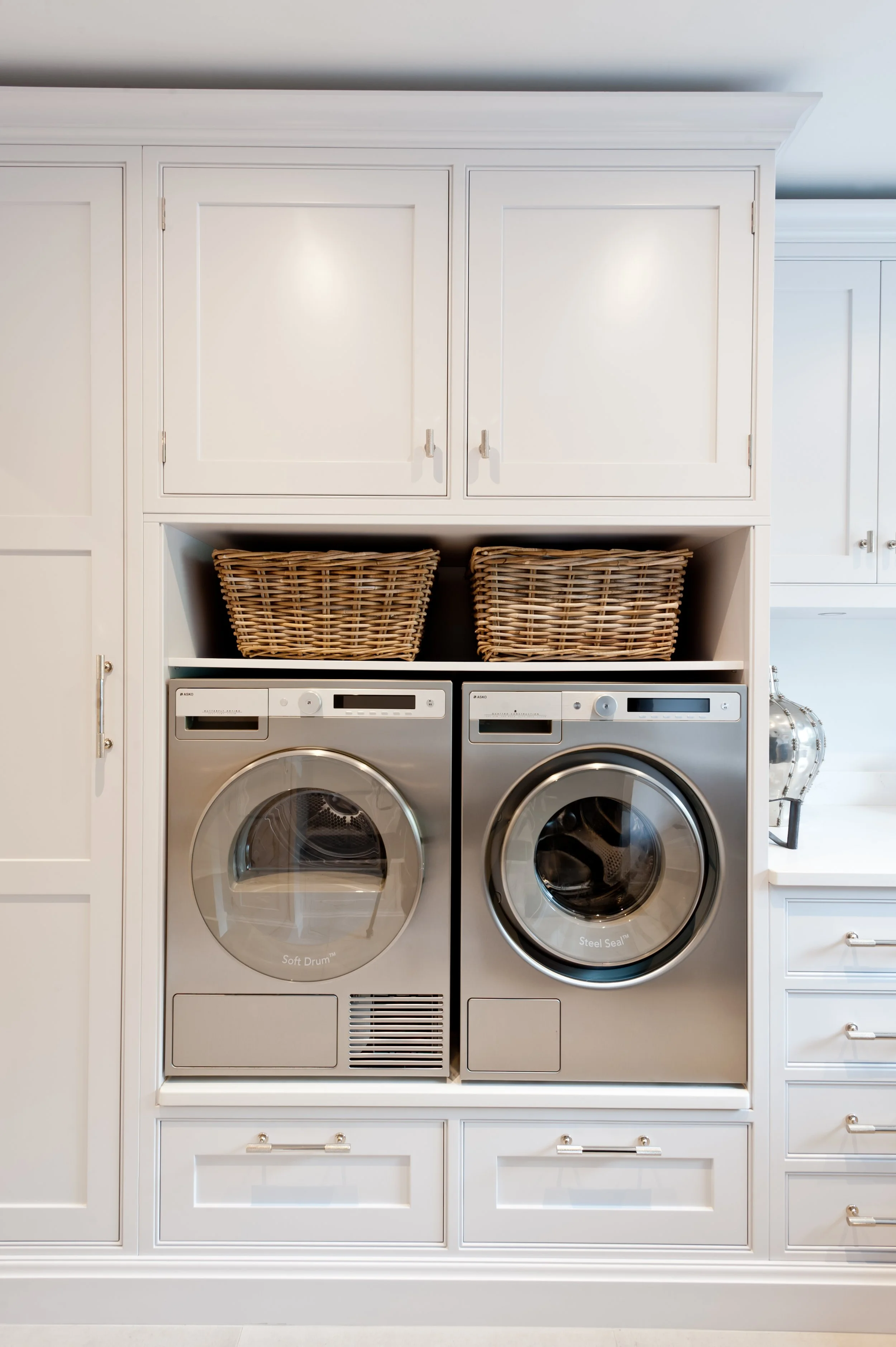 Much ado about laundry. Bespoke cabinetry turns the washing into something altogether better behaved.