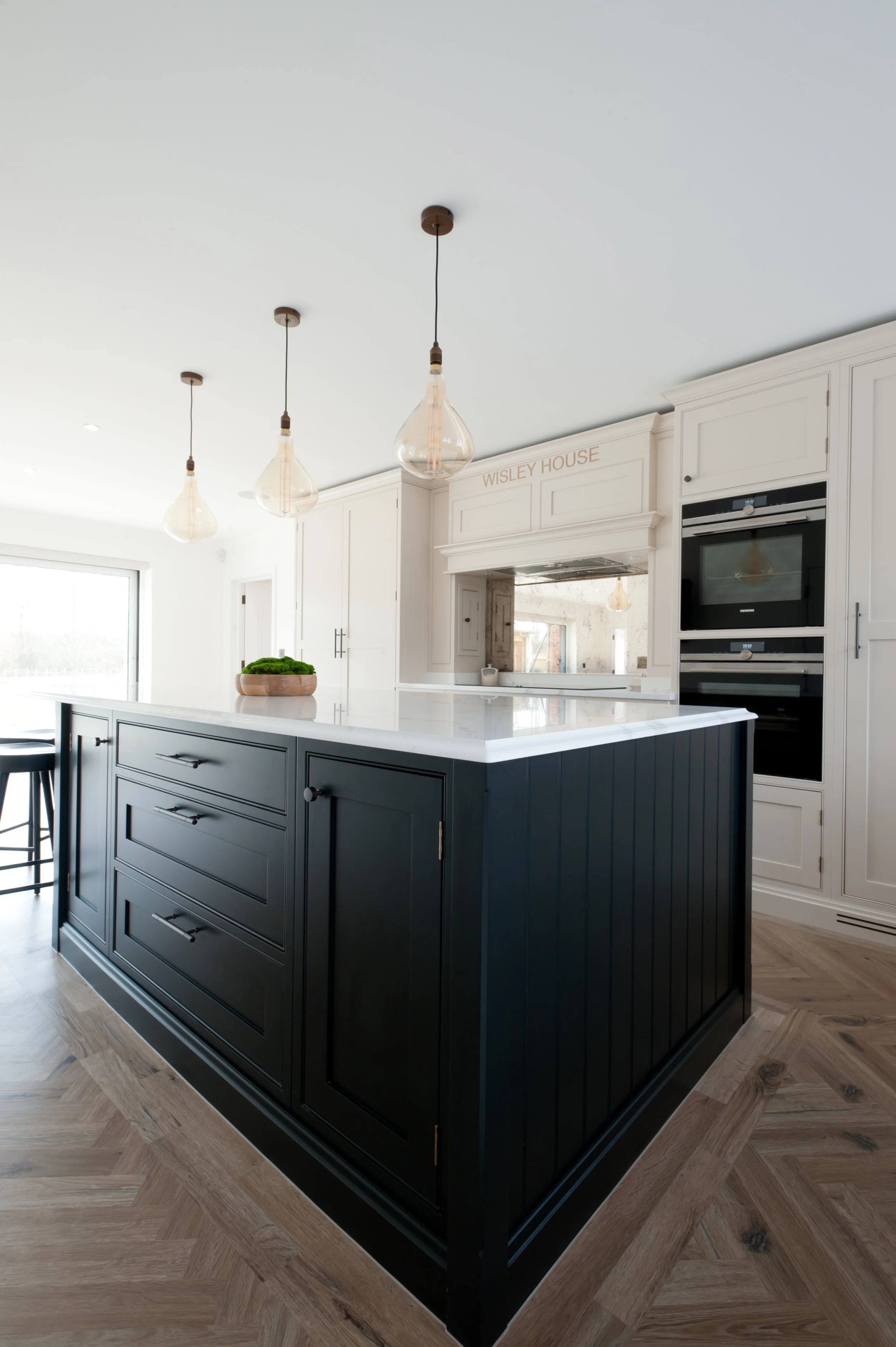 custom made kitchen with dark painted island kent