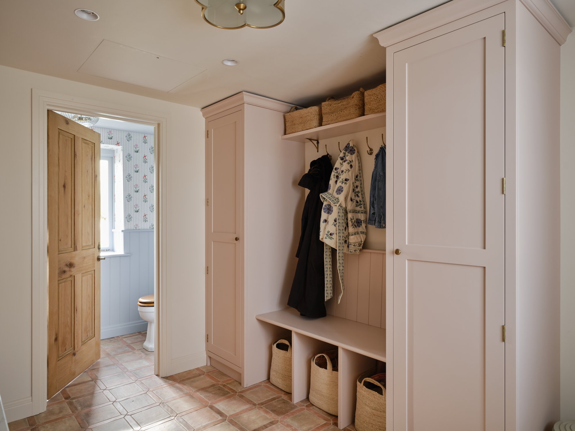 pretty pink shaker style boot room made in kent
