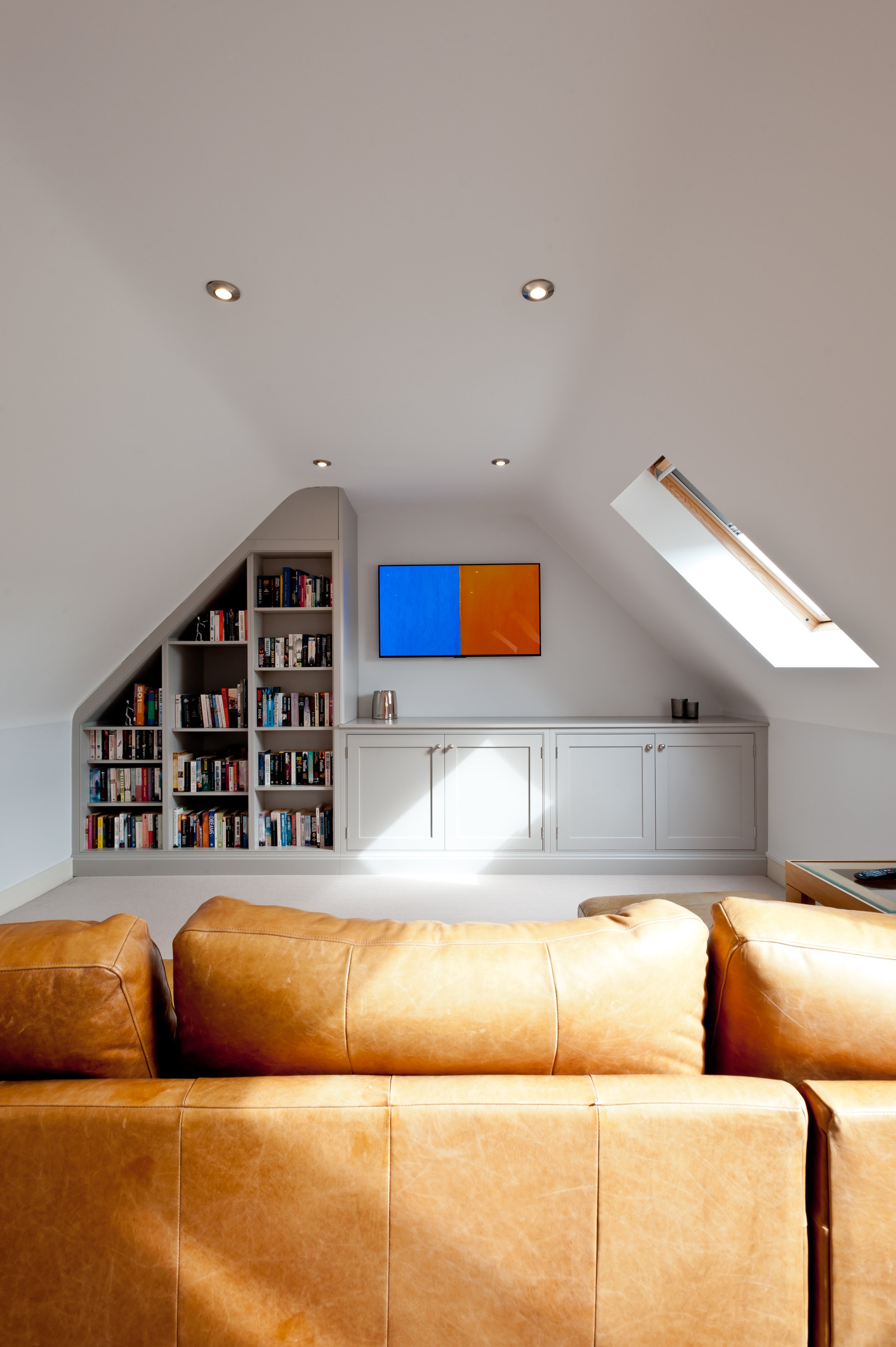 Read the room.
Bespoke fitted bookcases and media cabinetry designed around the architecture of this loft living space.
