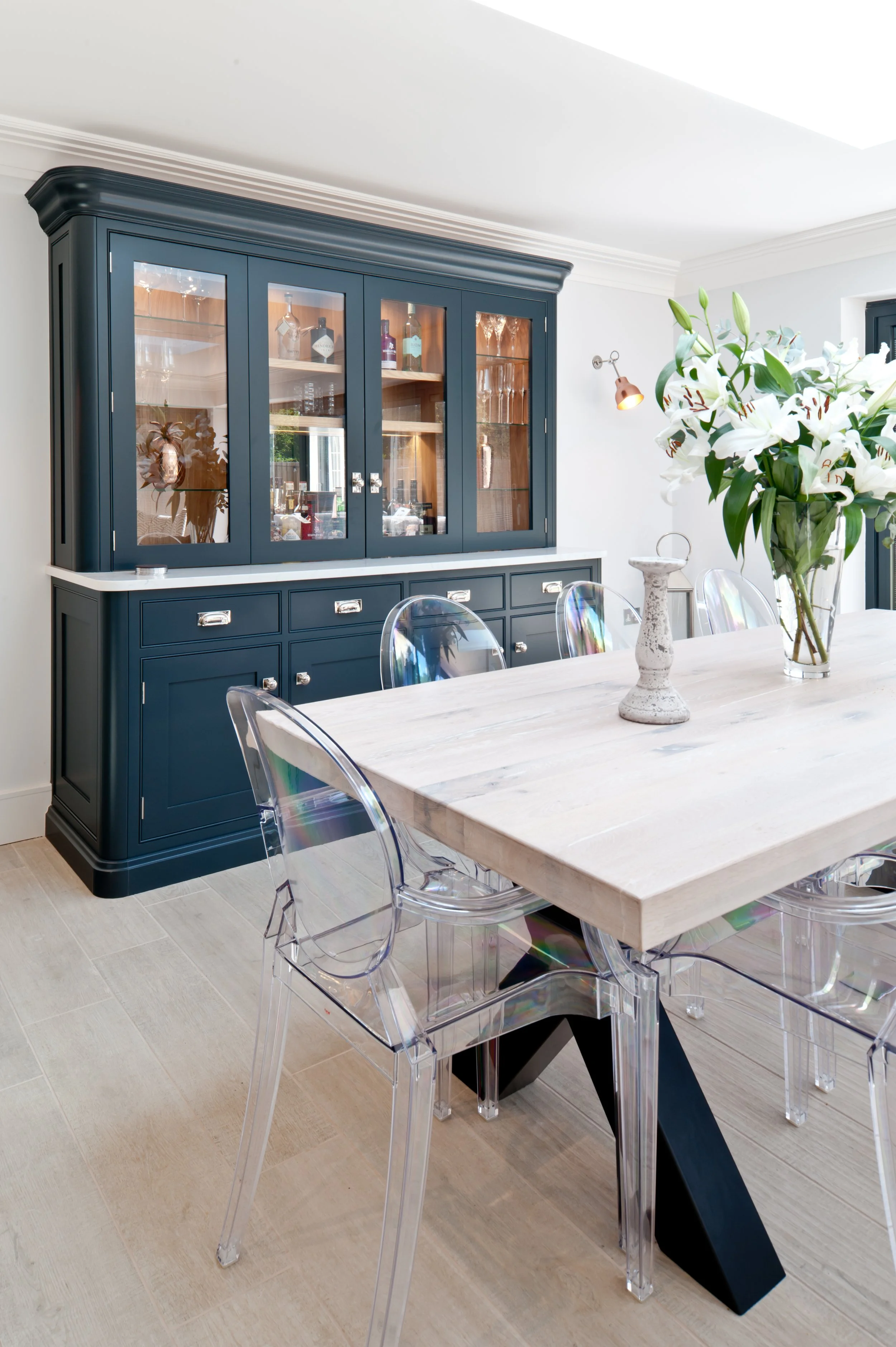 Dressed for dinner. A freestanding bespoke dining room dresser made for treasured glassware, tableware and everything worth displaying.