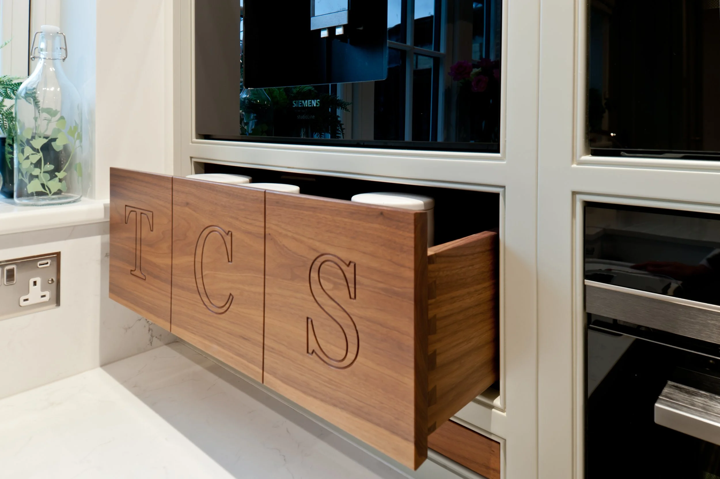 personalised drawer details in bespoke kitchen