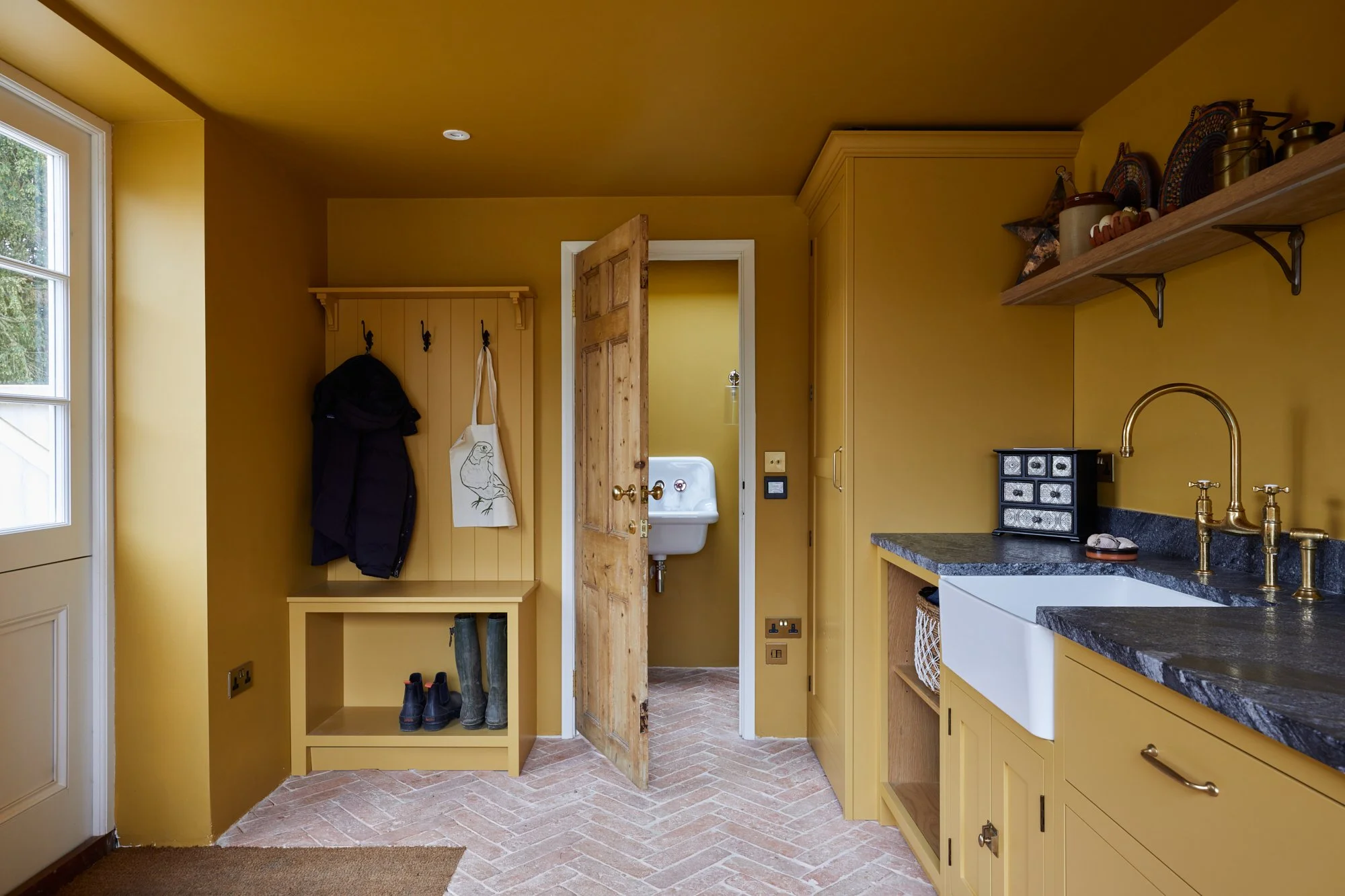 bespoke boot room and utility room in yellow