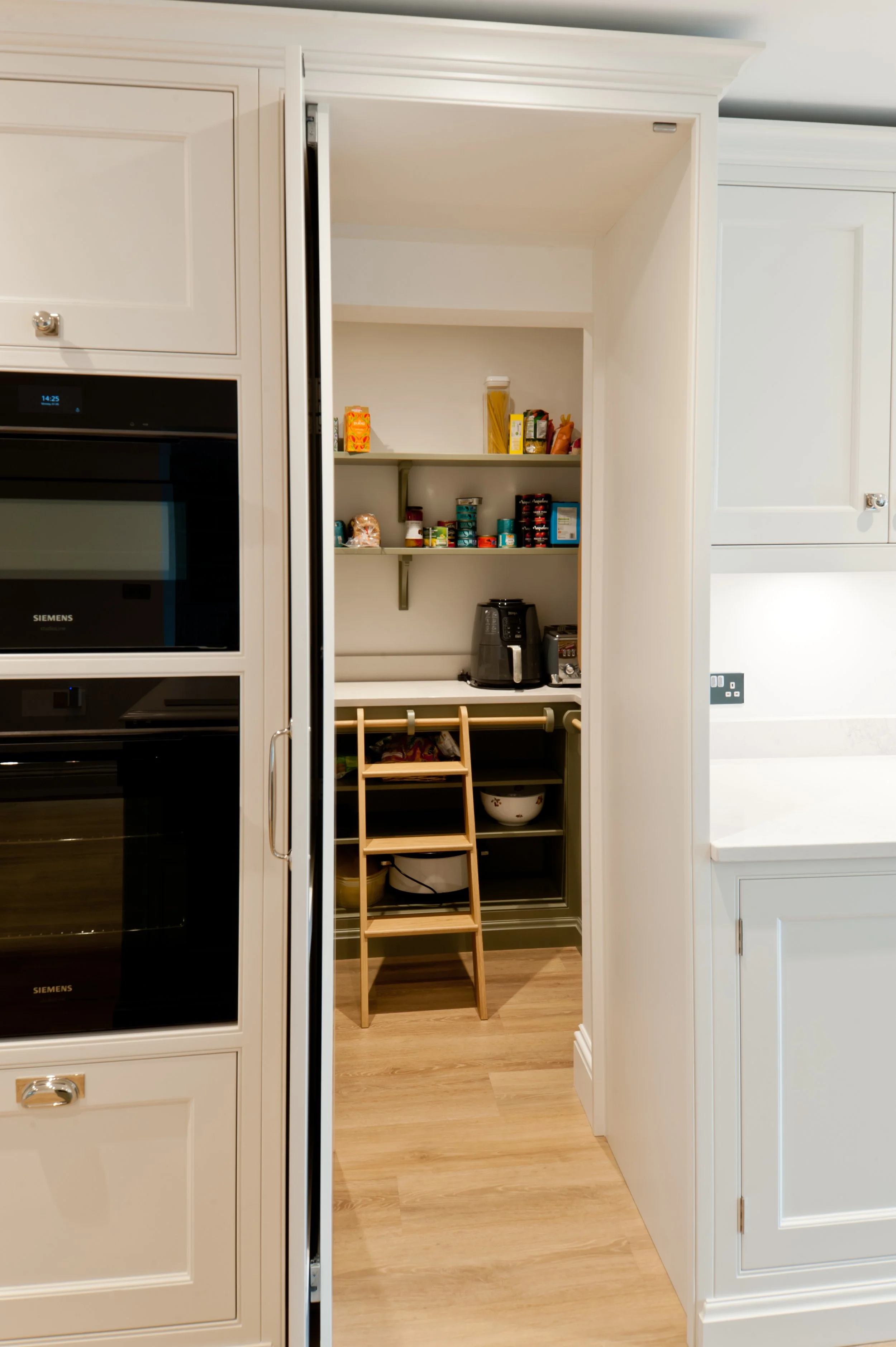 bespoke shaker kitchen with hidden pantry