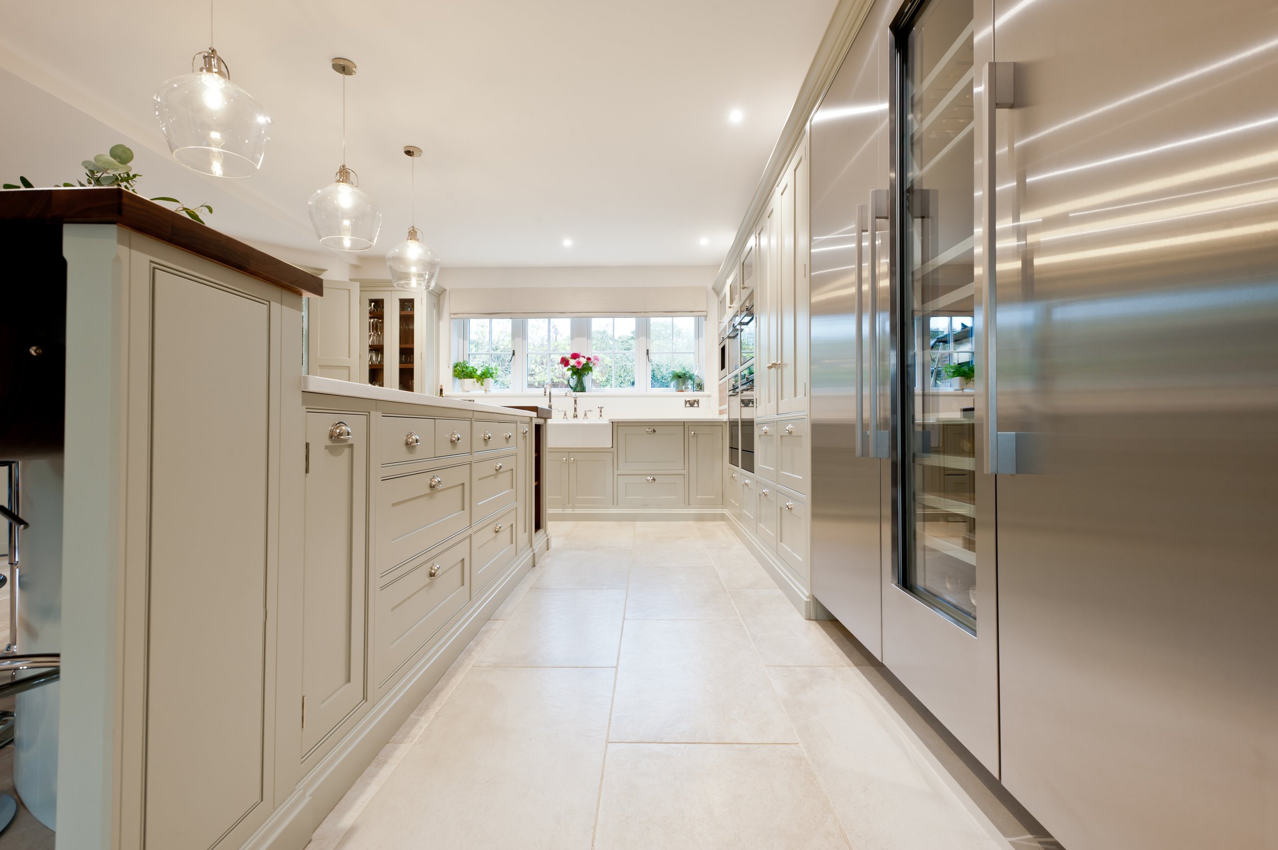 shaker style kitchen cabinetry in grey near hythe