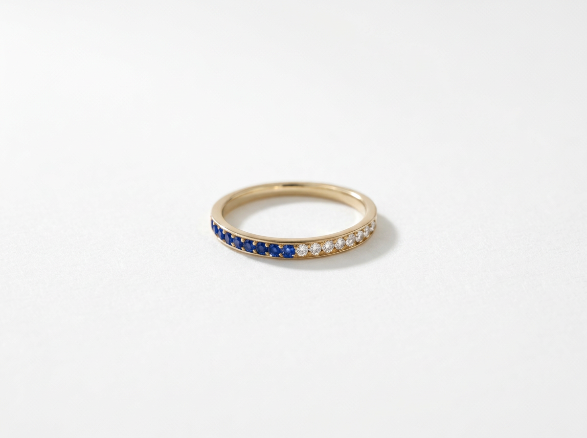The dreamer half half eternity ring - sapphire and diamond
