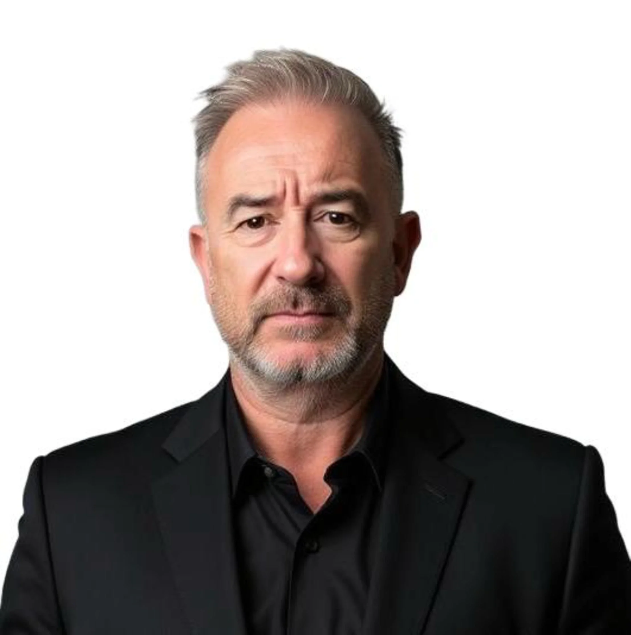 Brendan with gray hair, beard, and mustache, wearing a black suit and shirt, looking serious against a white background.