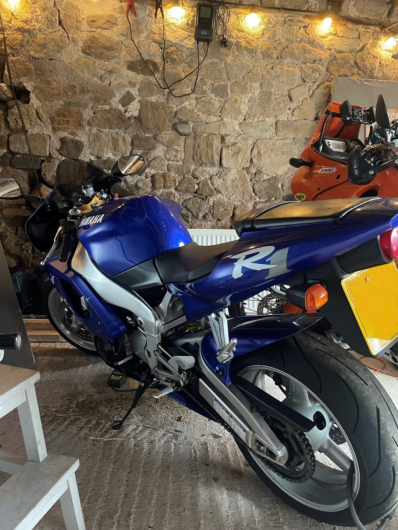 Couple of my bikes, waiting in the stables for some TLC over the winter. R1 is a very early 1998 bike, one of the 1st 600. KTM is my travel bike and has bounced off rocks most of its life. #ktm640adventure #ktm640lc4 #ktmridersclub #yamahar1 #vintage