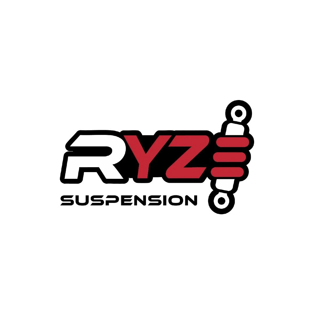 RYZ Suspension logo with stylized text and shock absorber graphic.