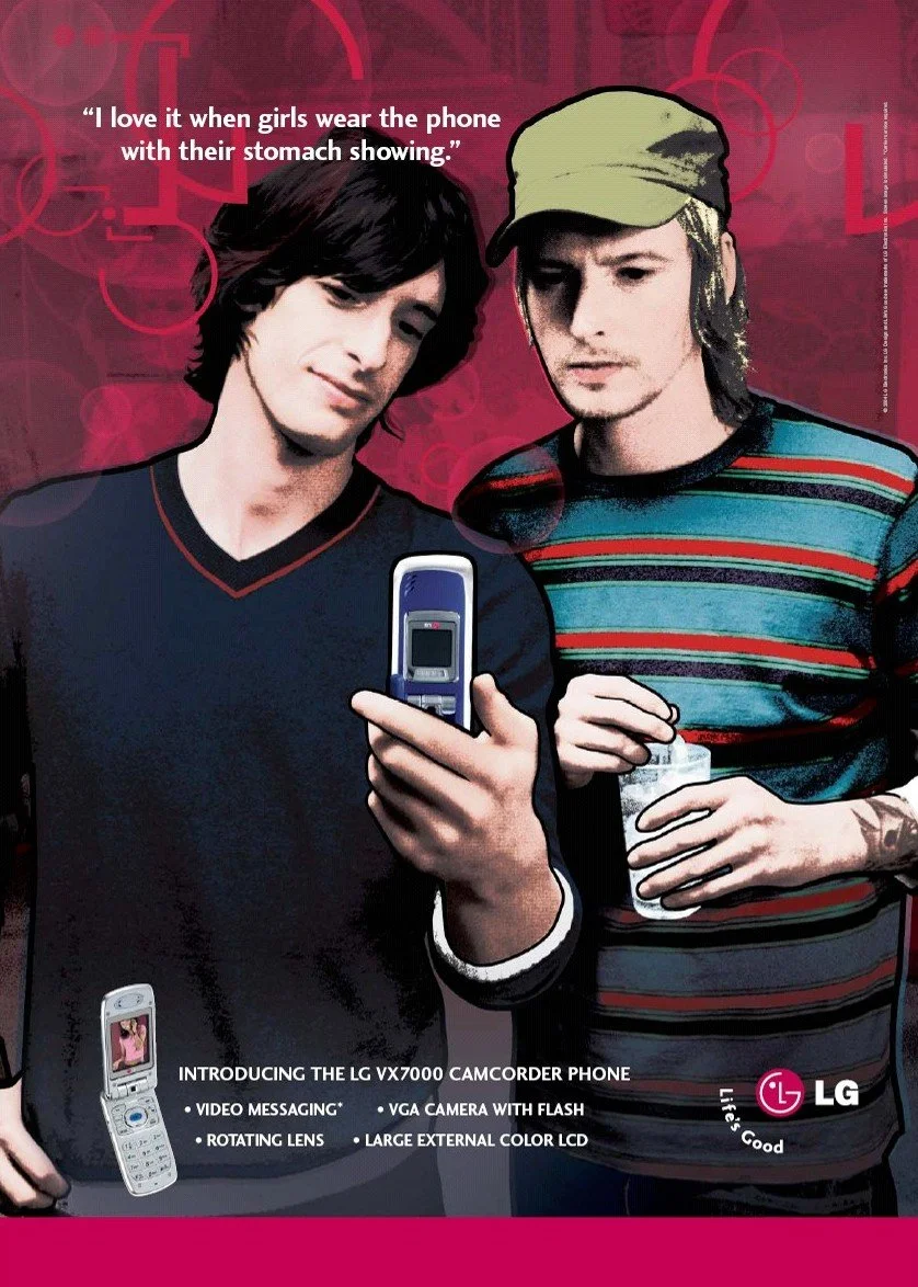 A marketing poster featuring two young men, one holding a flip phone, with a pink background and text promoting the LG VX7000 camcorder phone. The ad highlights features such as video messaging, VGA camera with flash, rotating lens, and large external color LCD.