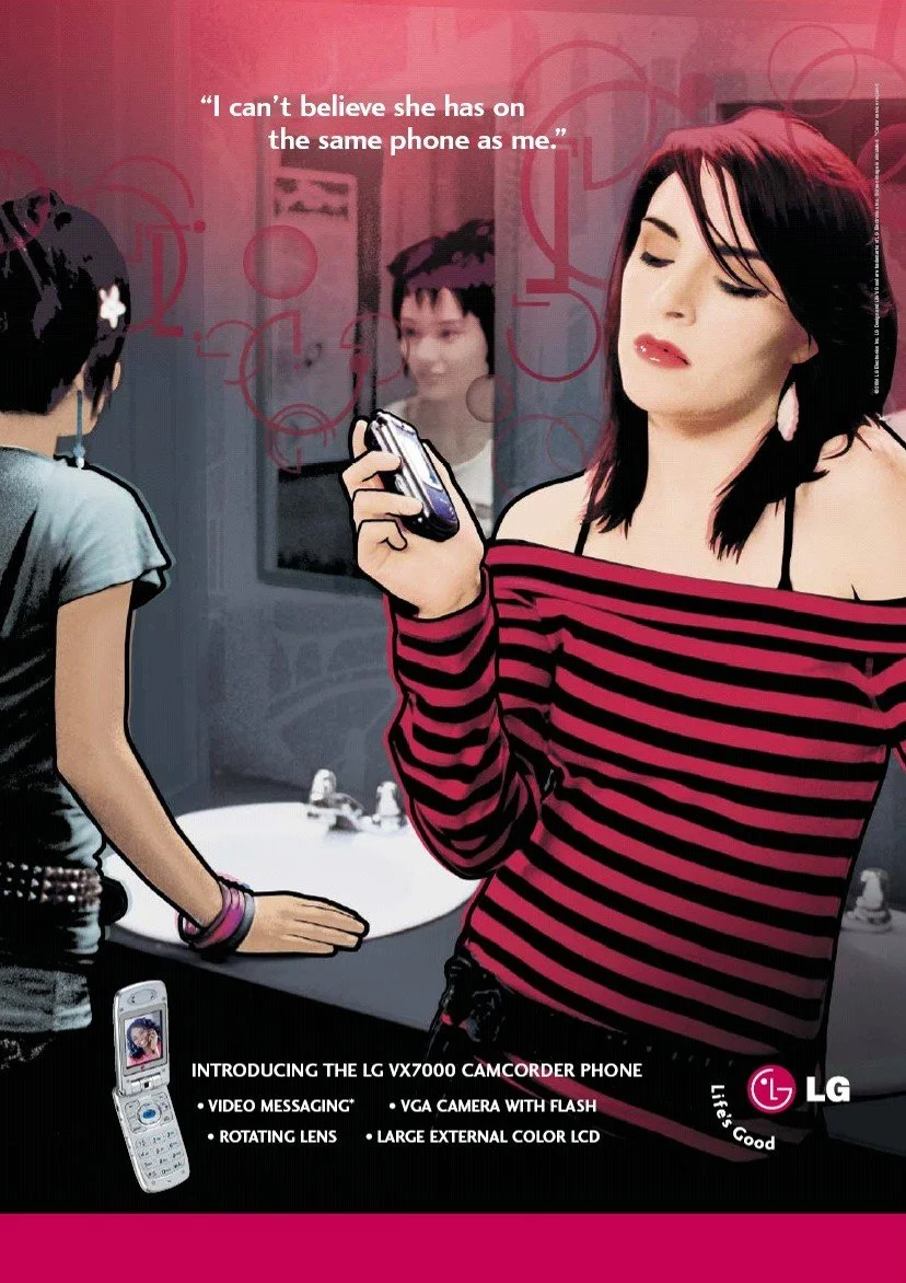 An advertisement for the LG VX7000 Camcorder Phone. The image shows a woman with dark hair and tattoos looking at her phone, with a girl in the background in front of a mirror, and a child on the left side of the image. The ad highlights features like video messaging, VGA camera with flash, rotating lens, large external color LCD, and large flip phone display.