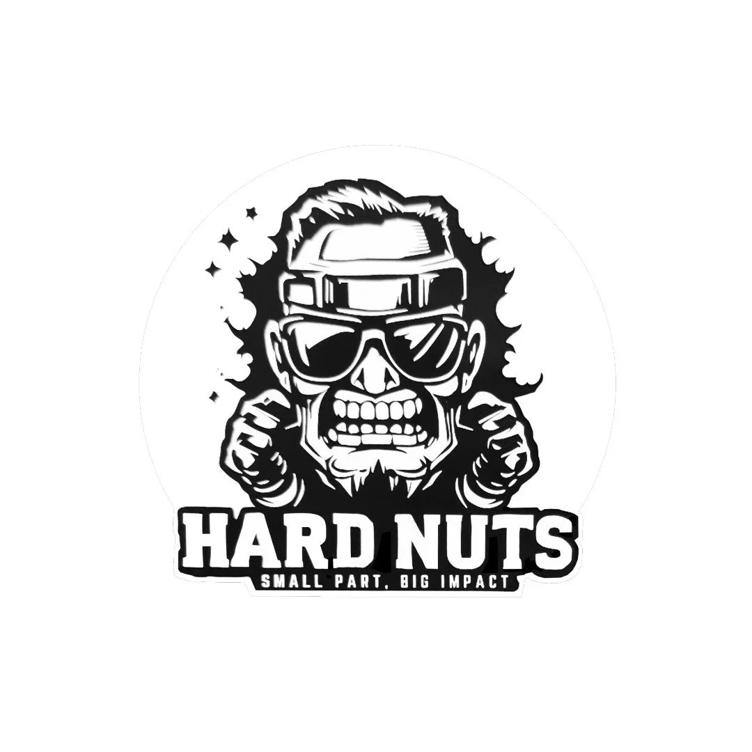 Black and white logo featuring a stylized skull with sunglasses, with the text 'HARD NUTS' and the tagline 'Small Part. Big Impact'.