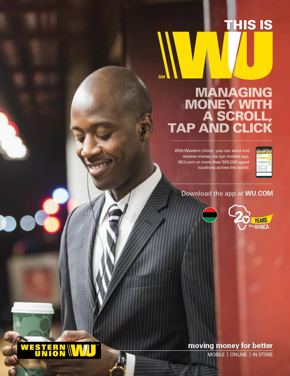 A man in a pinstripe suit holding a to-go coffee cup, smiling while looking at his phone, promoting Western Union's mobile money transfer services for Africa.