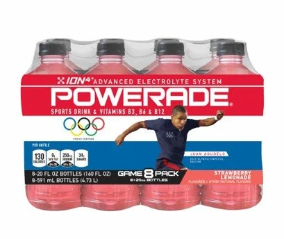 Eight-pack of Powerade sports drinks with strawberry flavor, featuring Olympic logo and athlete Juan Aguilar on the label.