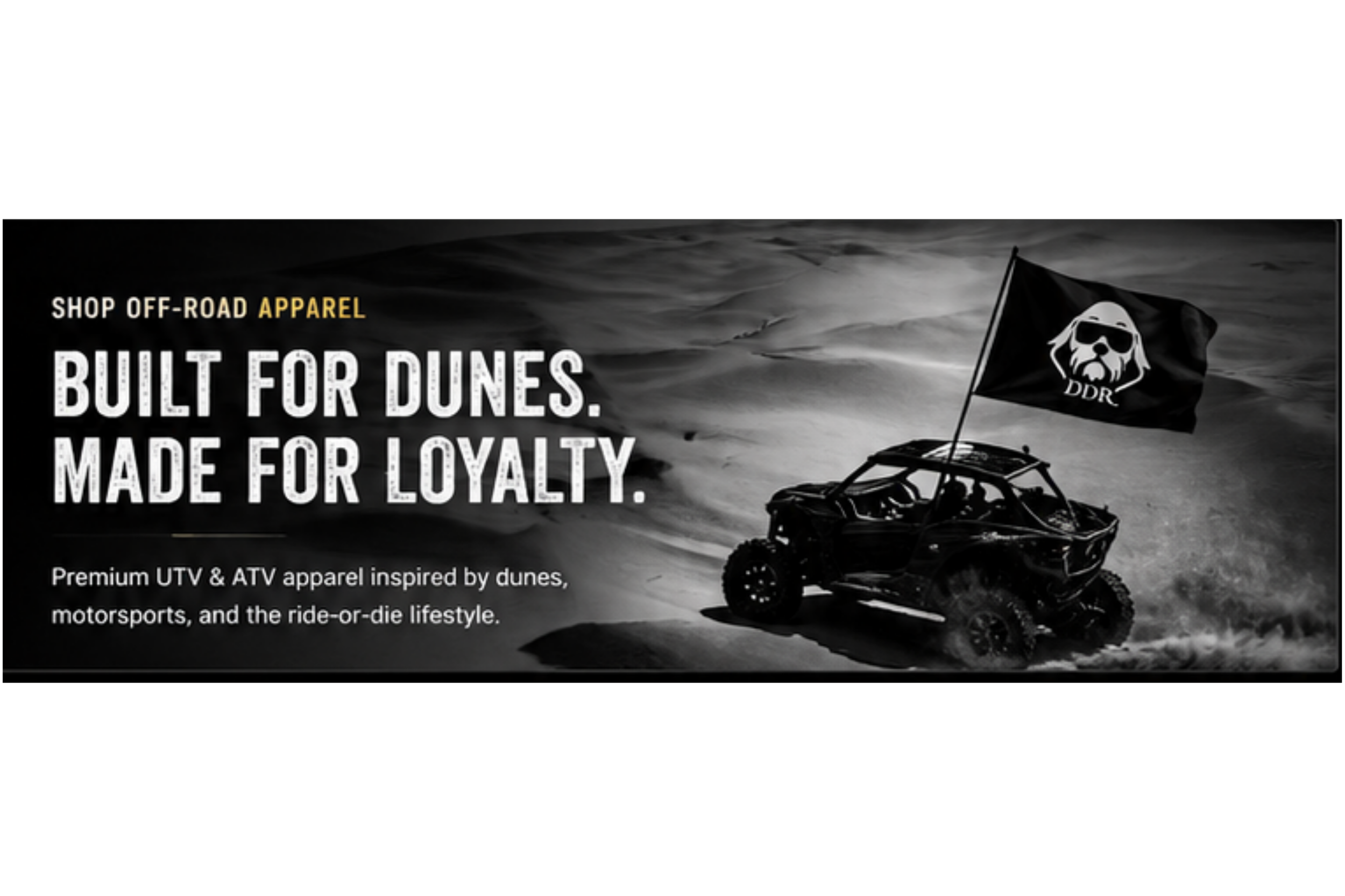 A black off-road vehicle with a flag that has a skull wearing sunglasses and the letters DDR. The background shows a desert landscape with sand dunes.