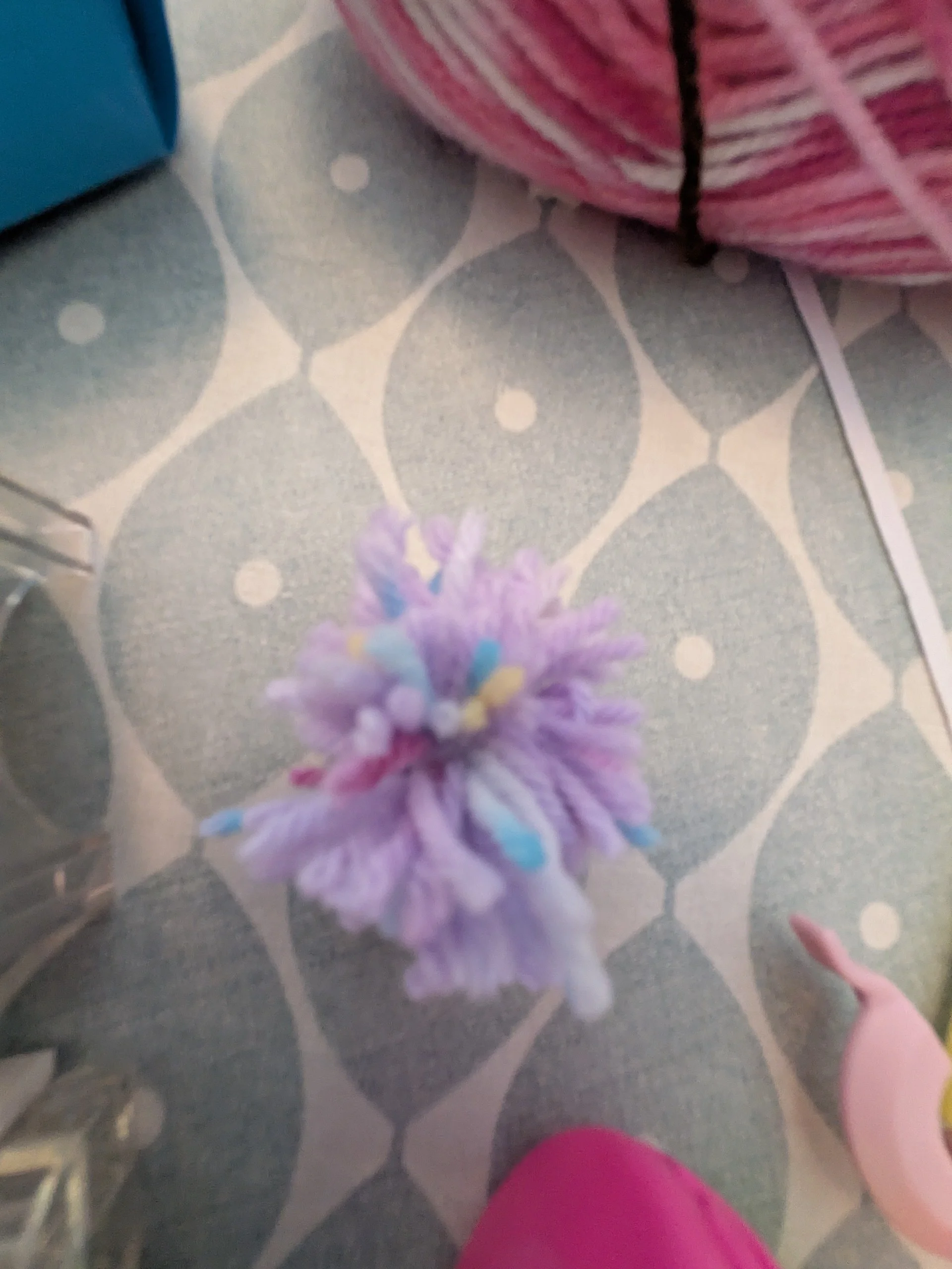 suprise pompom rainbow