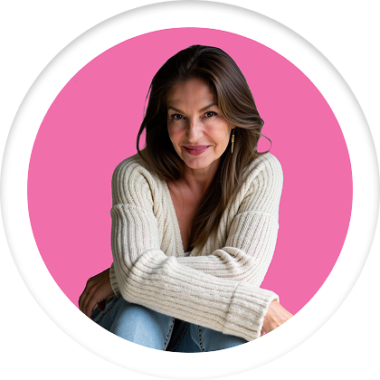 Portrait of Kat Downend, principal and creative leader, against a pink background.