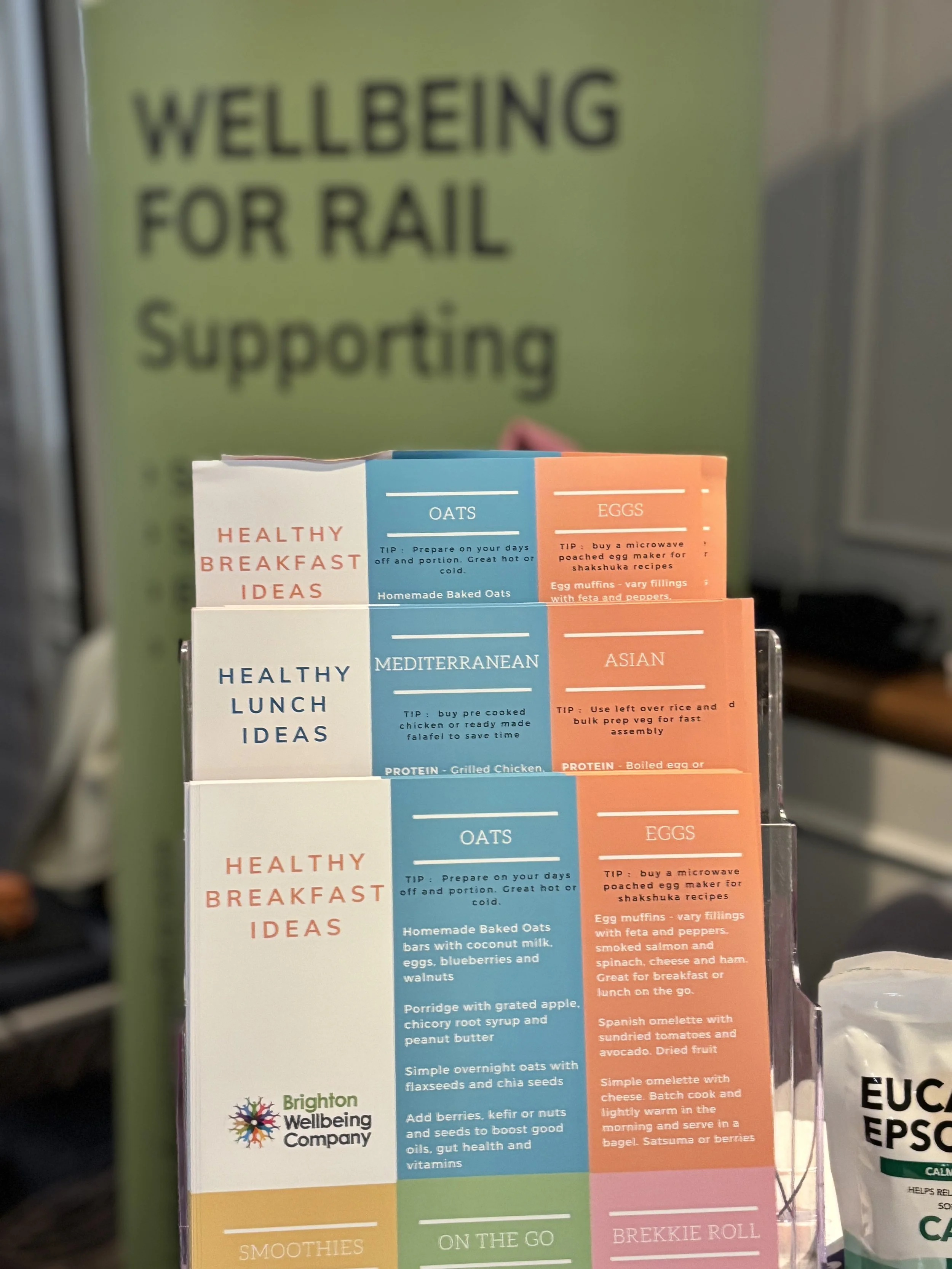 A display of healthy breakfast ideas from Brighton Wellbeing Company, including oat, Mediterranean, and oat with eggs options, each with cooking tips.