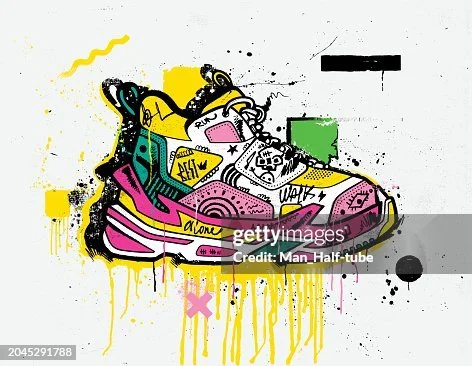 Colorful, stylized sneaker with graffiti-like paint splatters and abstract shapes in yellow, pink, green, black, and white.