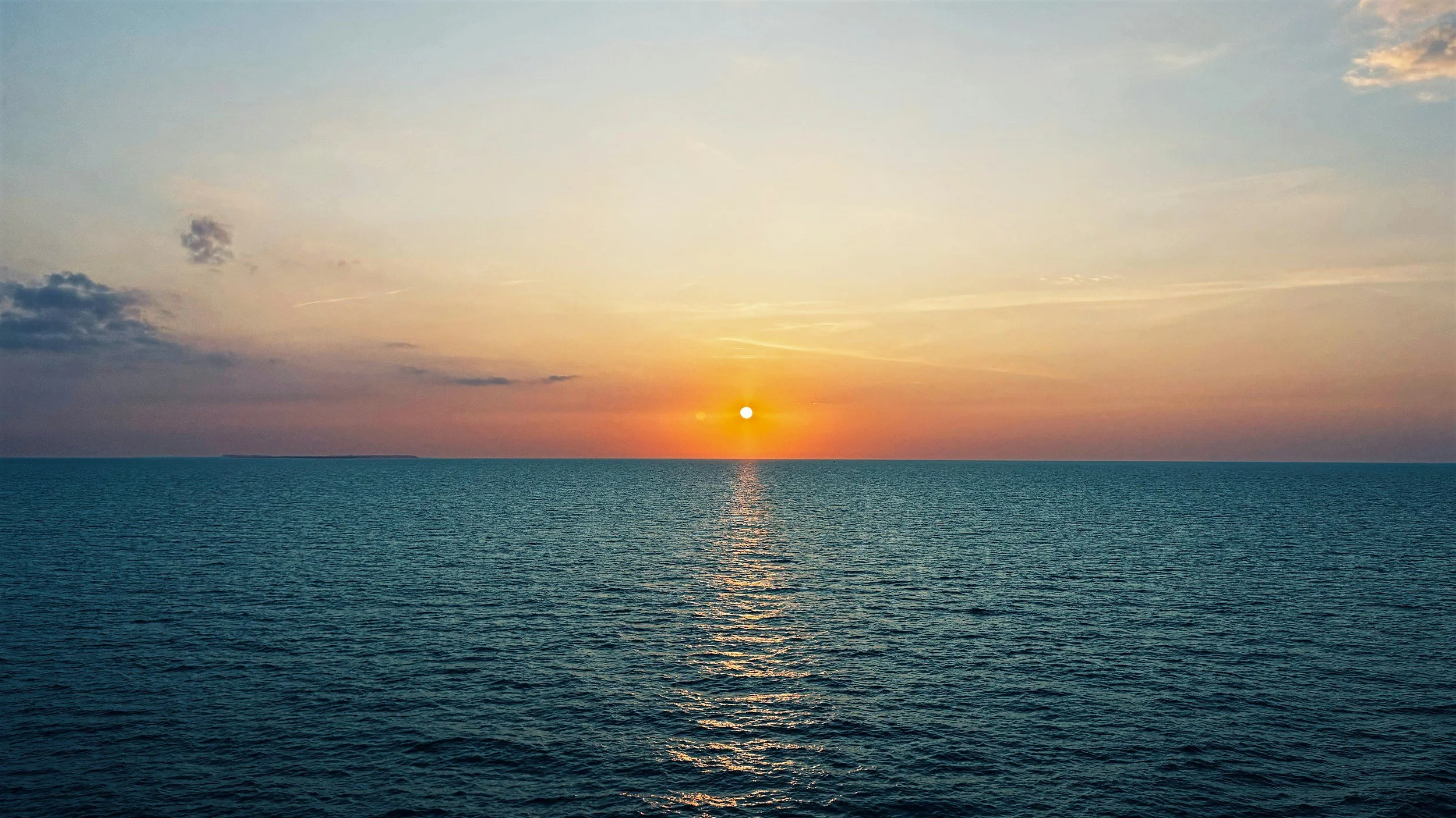 Open water with a clear horizon, representing reduced avoidance and greater emotional openness