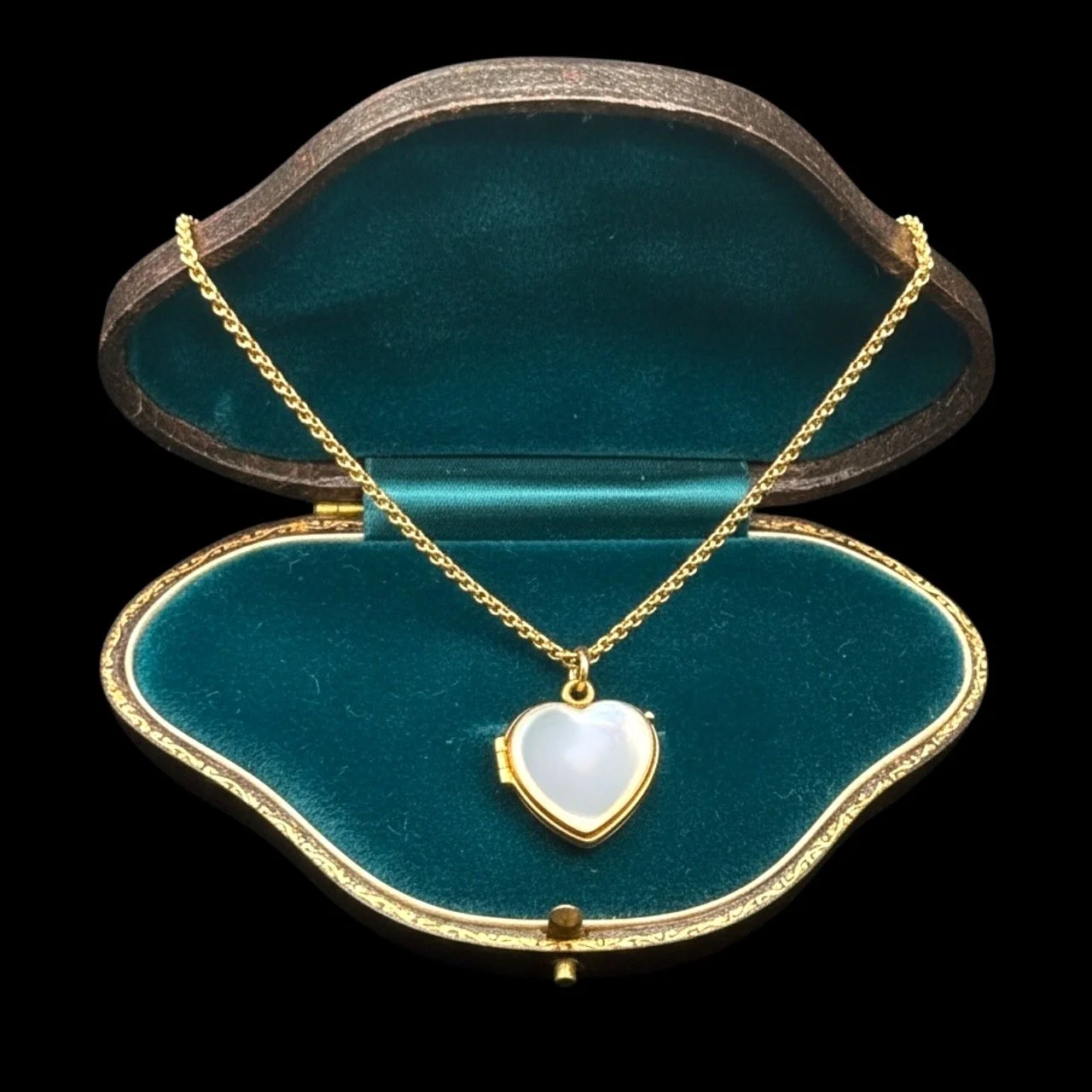 Pool of Light Rock Crystal Heart Locket 9ct Gold