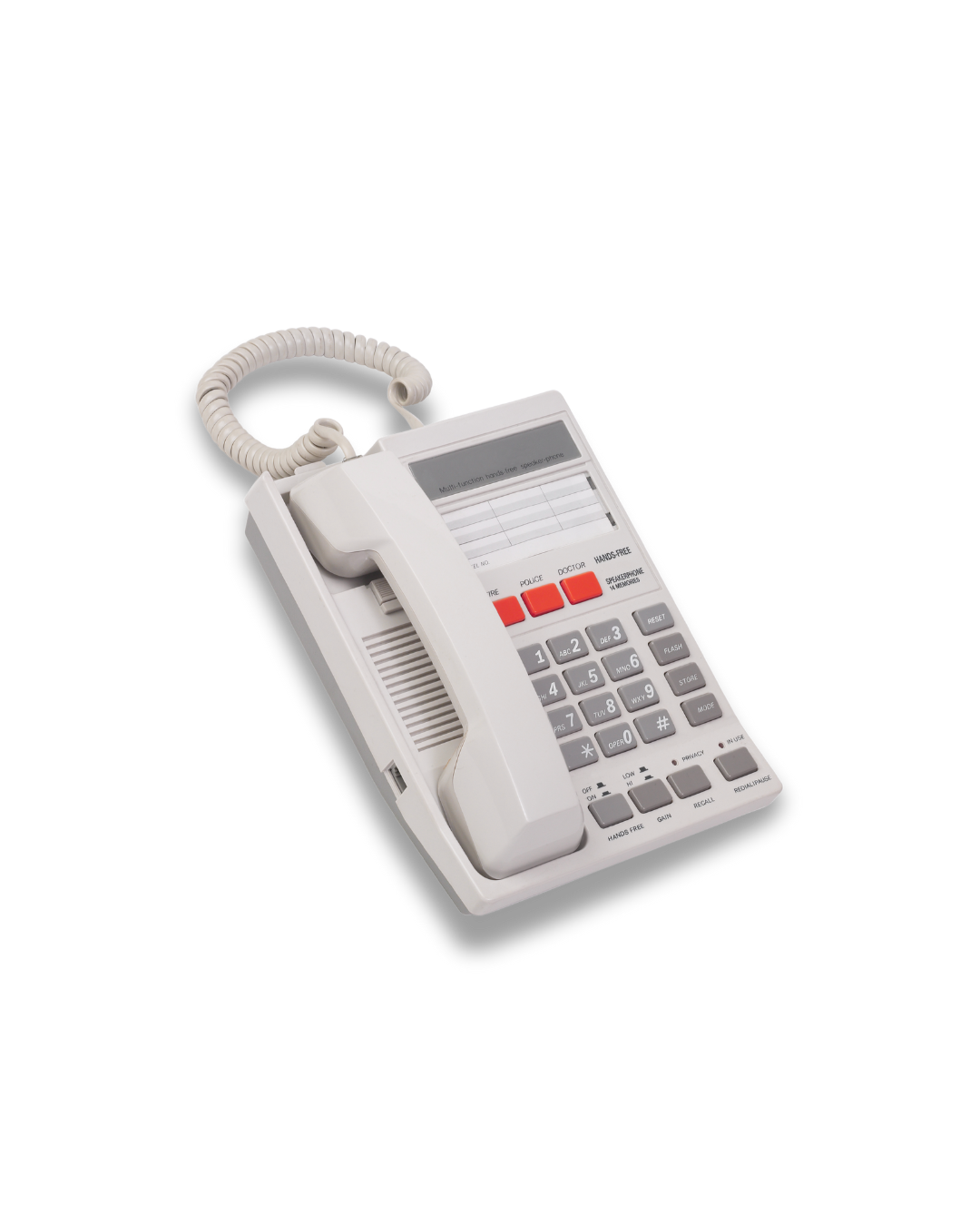 White landline telephone with cord and digital display