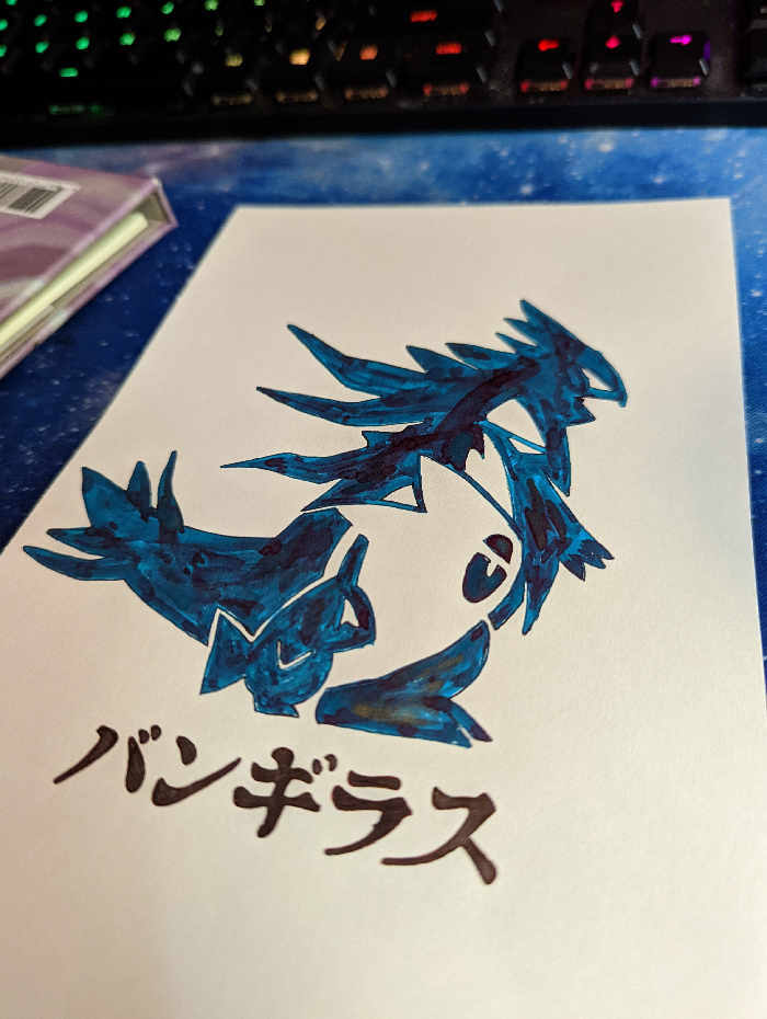 A ink art piece of Tyranitar with silhouettes of pre-evolutions Larvitar and Pupitar inside of it on white paper, with Japanese characters below it.