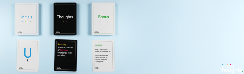 A set of six cards or boxes labeled 'Initials,' 'Thoughts,' 'Bonus,' 'U 3,' with two of them being black and the rest white, arranged on a light blue surface against a light blue background.