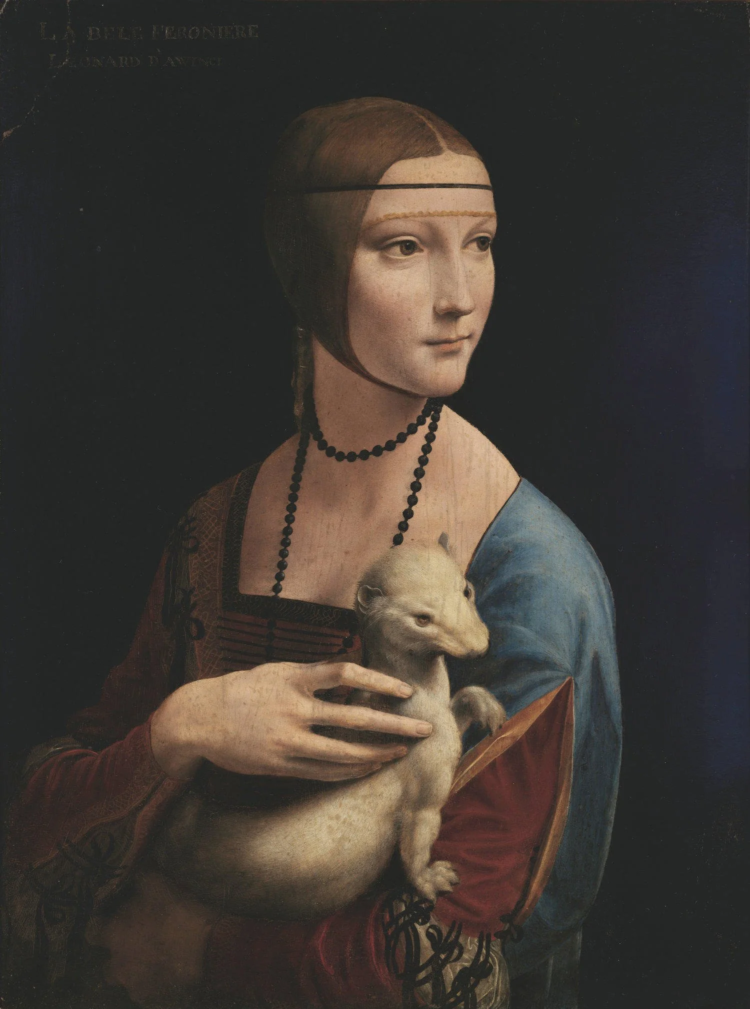 A painting of a woman with pale skin and reddish-brown hair, holding a small dog. The woman wears a blue and red garment, a black beaded necklace, and a thin gold headband. The background is dark, and there is some text in the top left corner.