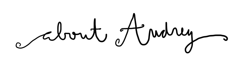 Handwritten text that says 'about Audrey' in cursive style.
