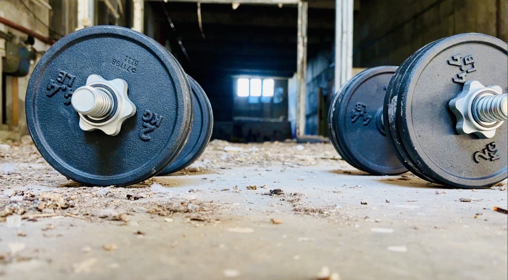 Photo of a dumbbell on a concrete floor