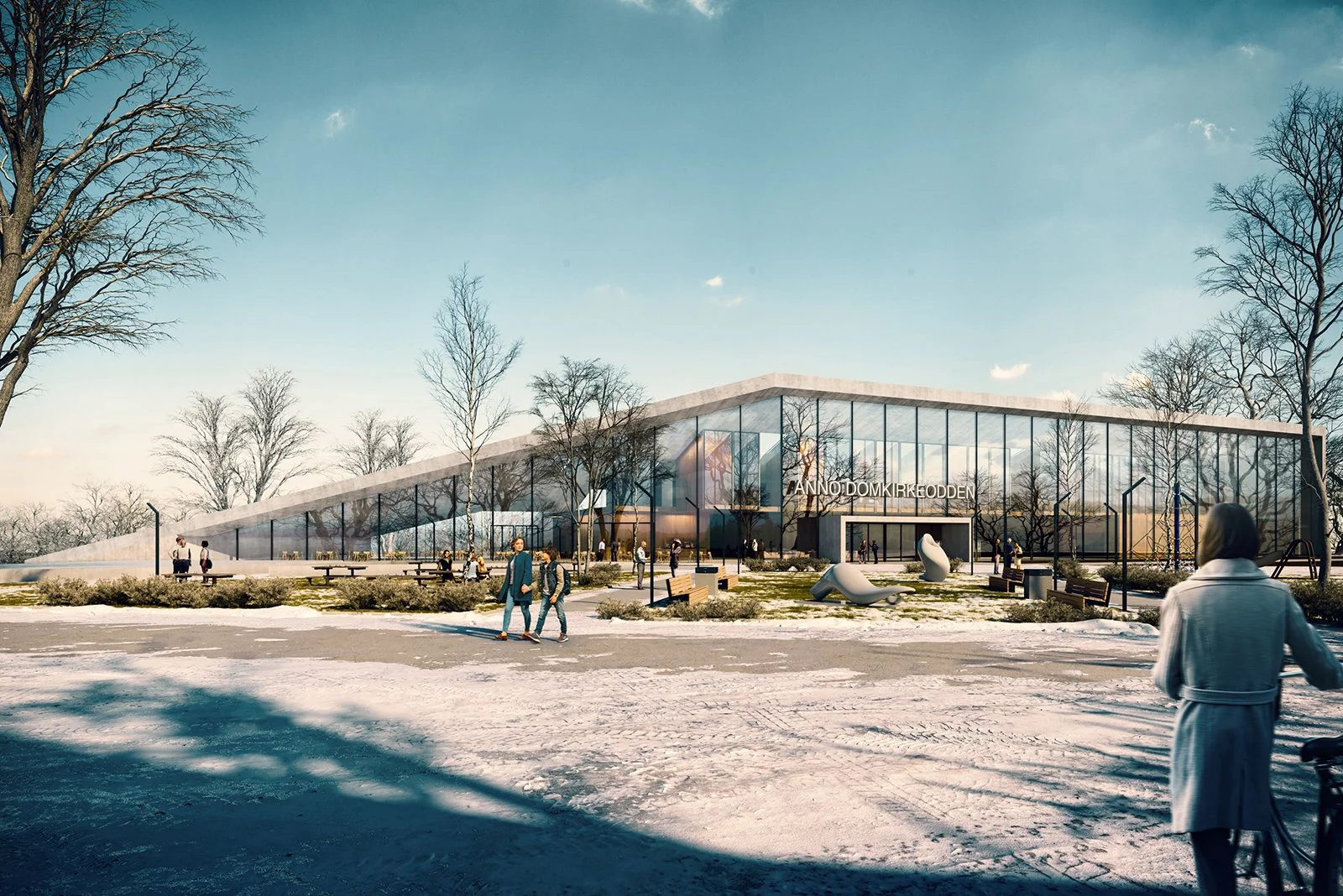 A modern glass building in a winter setting with snow on the ground and leafless trees. Several people are walking or sitting outside, and the sky is partly cloudy.