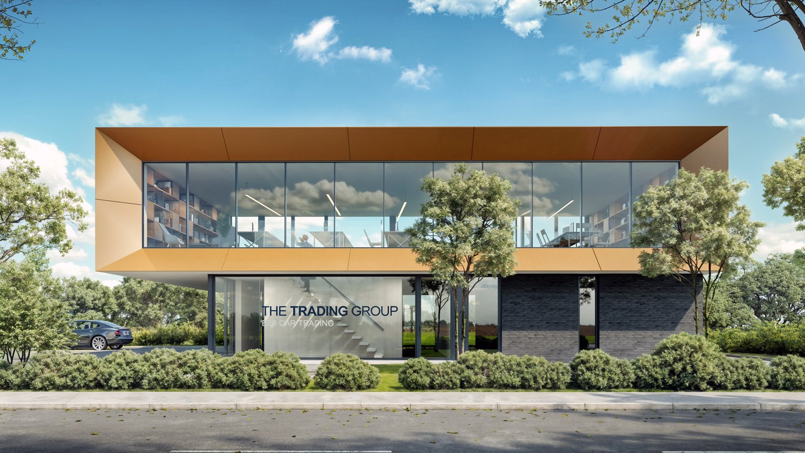 Modern two-story office building with glass walls, labeled 'The Trading Group,' surrounded by trees and bushes, with a car parked nearby under a clear blue sky.