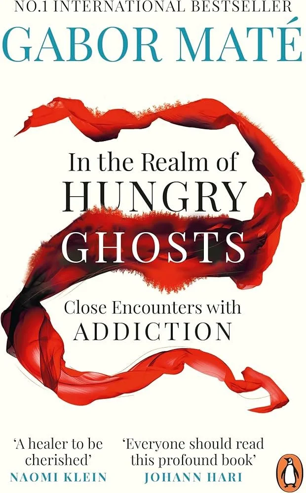 Book cover titled 'In the Realm of Hungry Ghosts: Close Encounters with Addiction' by Gabor Maté, featuring red abstract ribbon-like design, with quotes from Naomi Klein and Johann Hari, and Penguin logo at the bottom right.