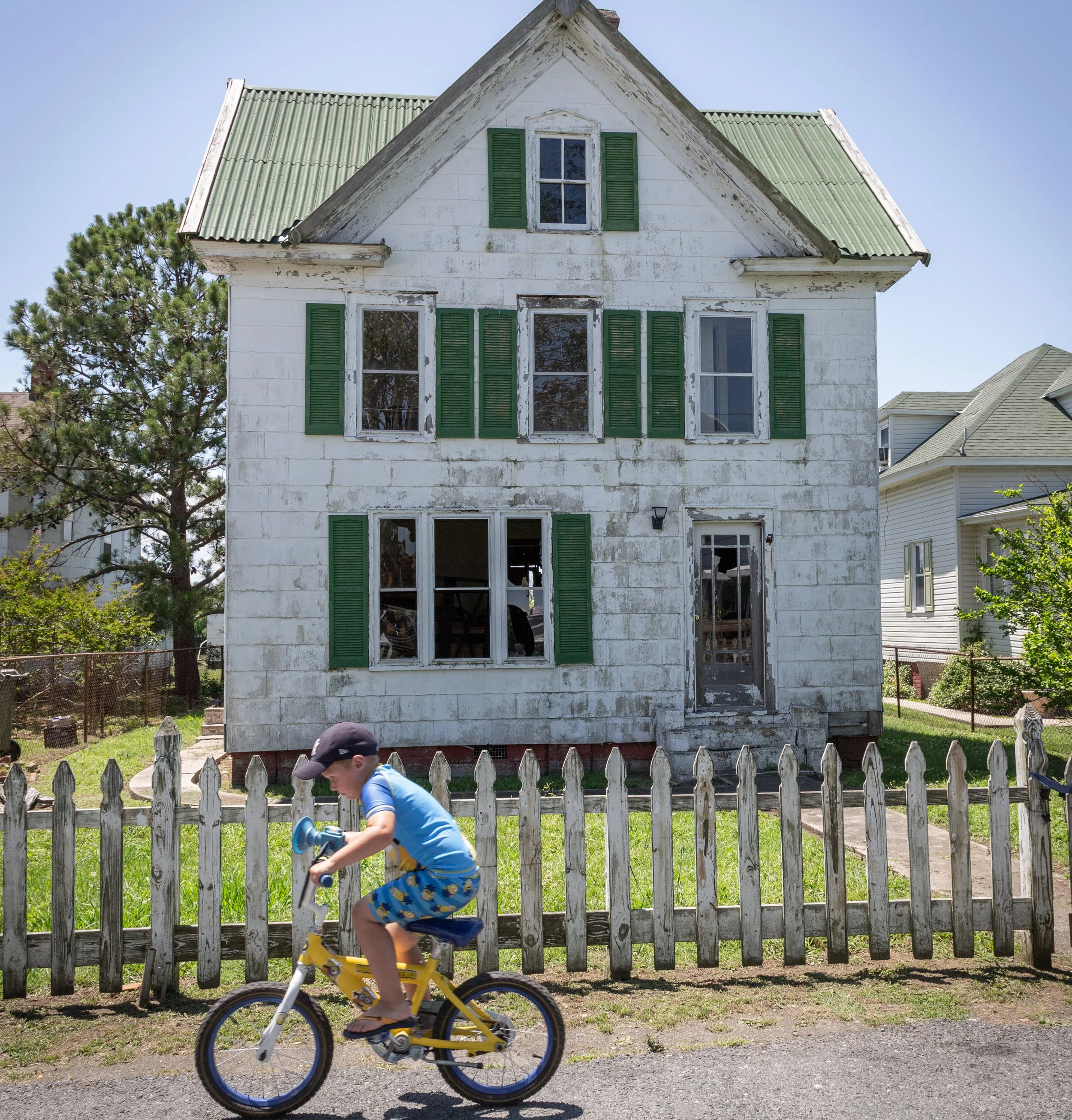 1-Tangier Island_Neighborhood Kid on Bike_Street Scenes 2023.jpg
