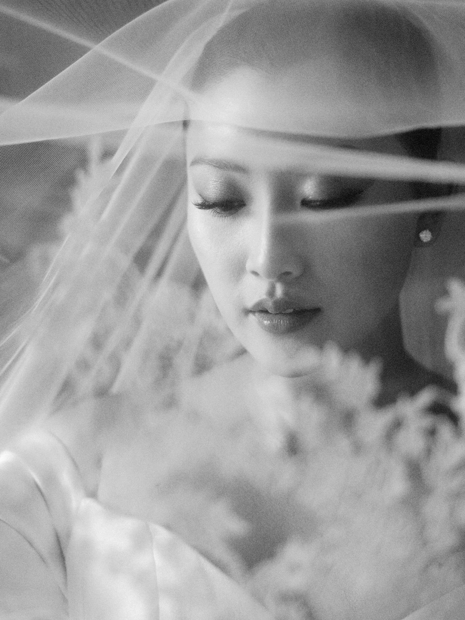 Intimate black and white bridal portrait under veil at Blue Hill at Stone Barns photographed by Jenny Fu