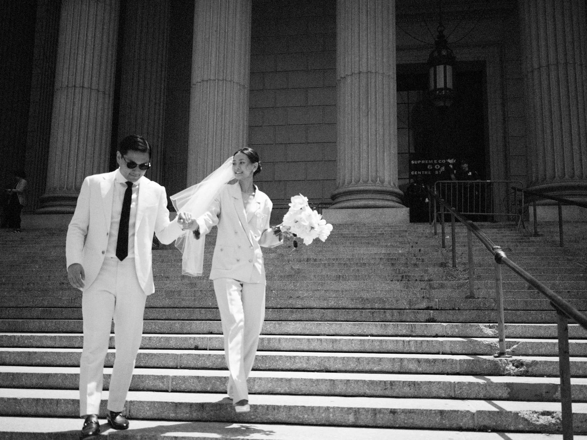 couple-exiting-manhattan-city-hall-wedding-jenny-fu.JPG