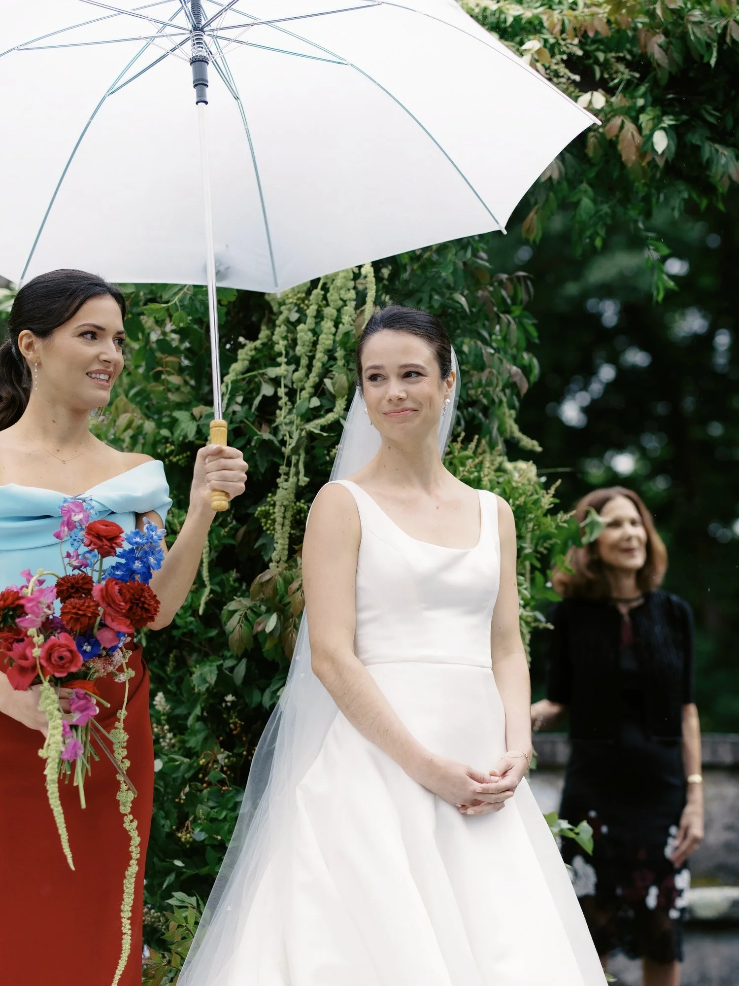 aa-0658-bride-smiling-during-rainy-ceremony-troutbeck-amenia-ny-planned-by-ashley-douglass-jenny-fu.jpg
