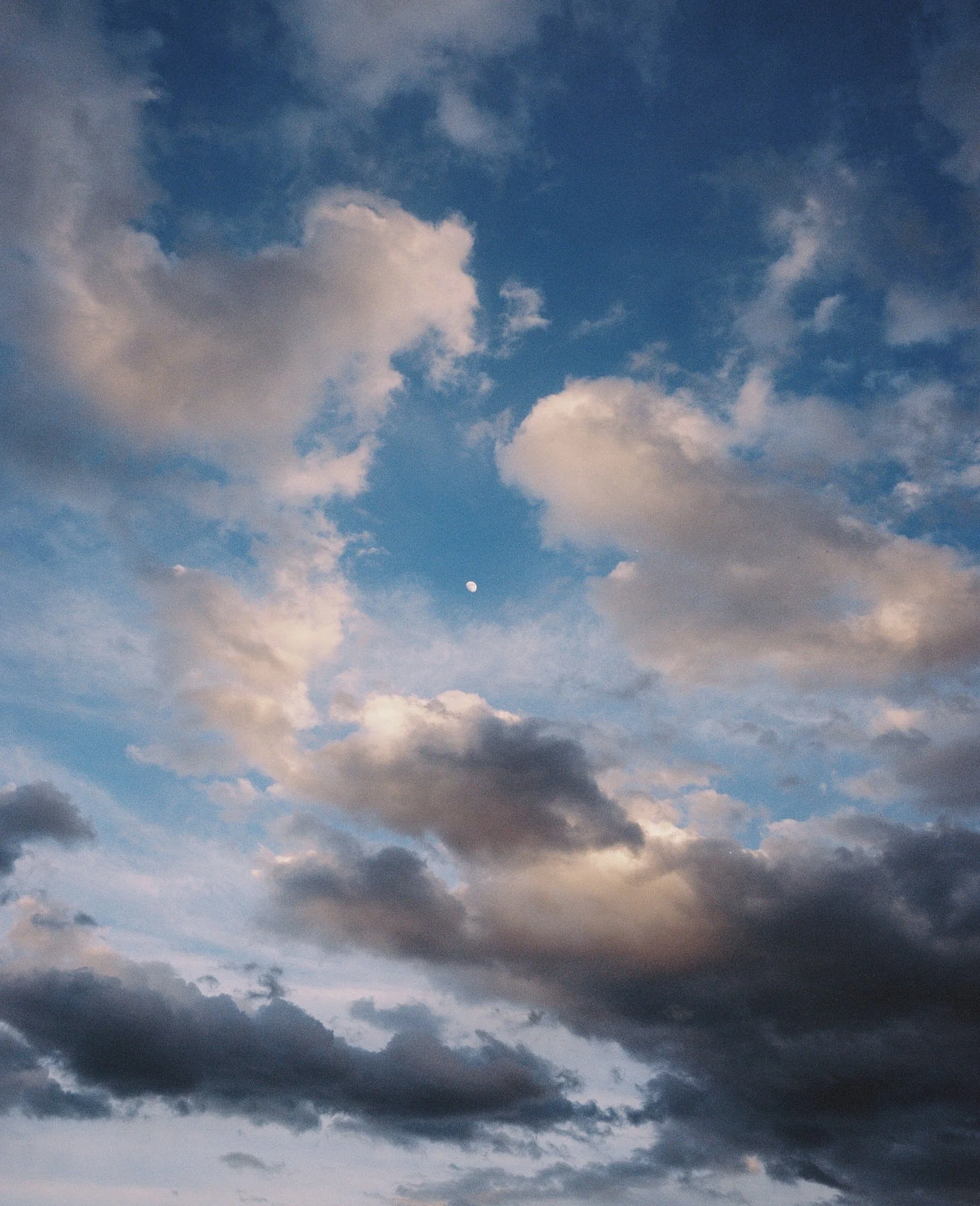 montana48-dramatic-evening-sky-with-clouds-and-moon-wyoming-jackson-hole-jenny-fu.jpg