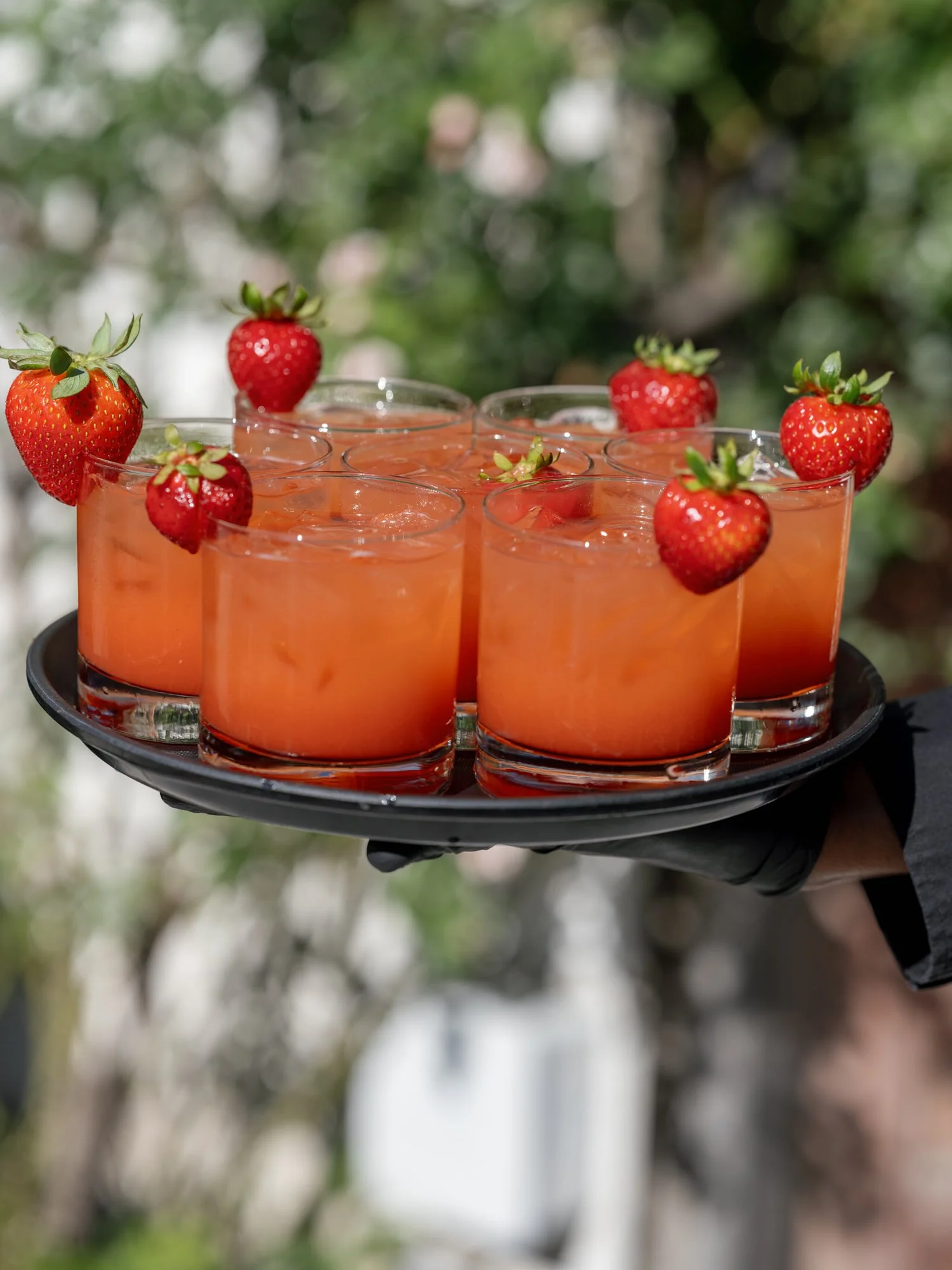 Tray of strawberry cocktails garnished with whole berries at Valley Rock Inn in Sloatsburg, photographed by Jenny Fu.