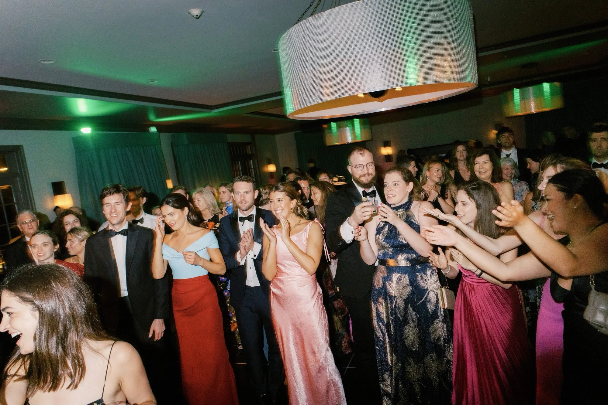aa-1124-guests-watching-dance-floor-cheering-troutbeck-amenia-ny-planned-by-ashley-douglass-jenny-fu.jpg