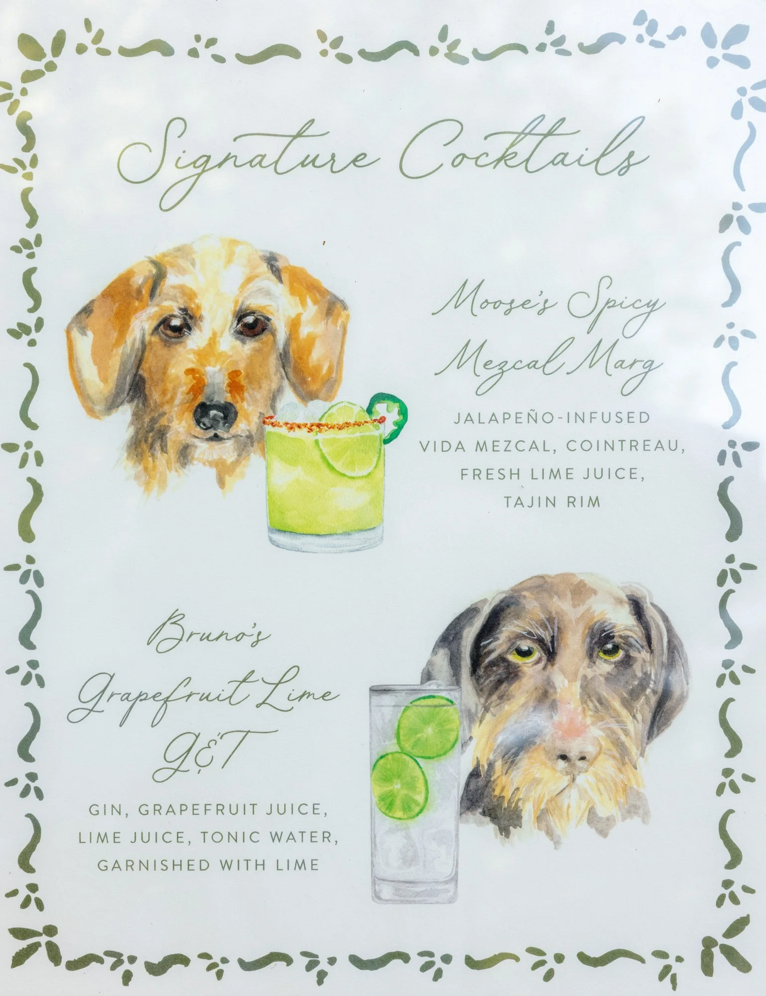 Custom illustrated cocktail sign featuring watercolor portraits of the couple’s dogs and signature drinks at Troutbeck in Amenia, photographed by Jenny Fu.