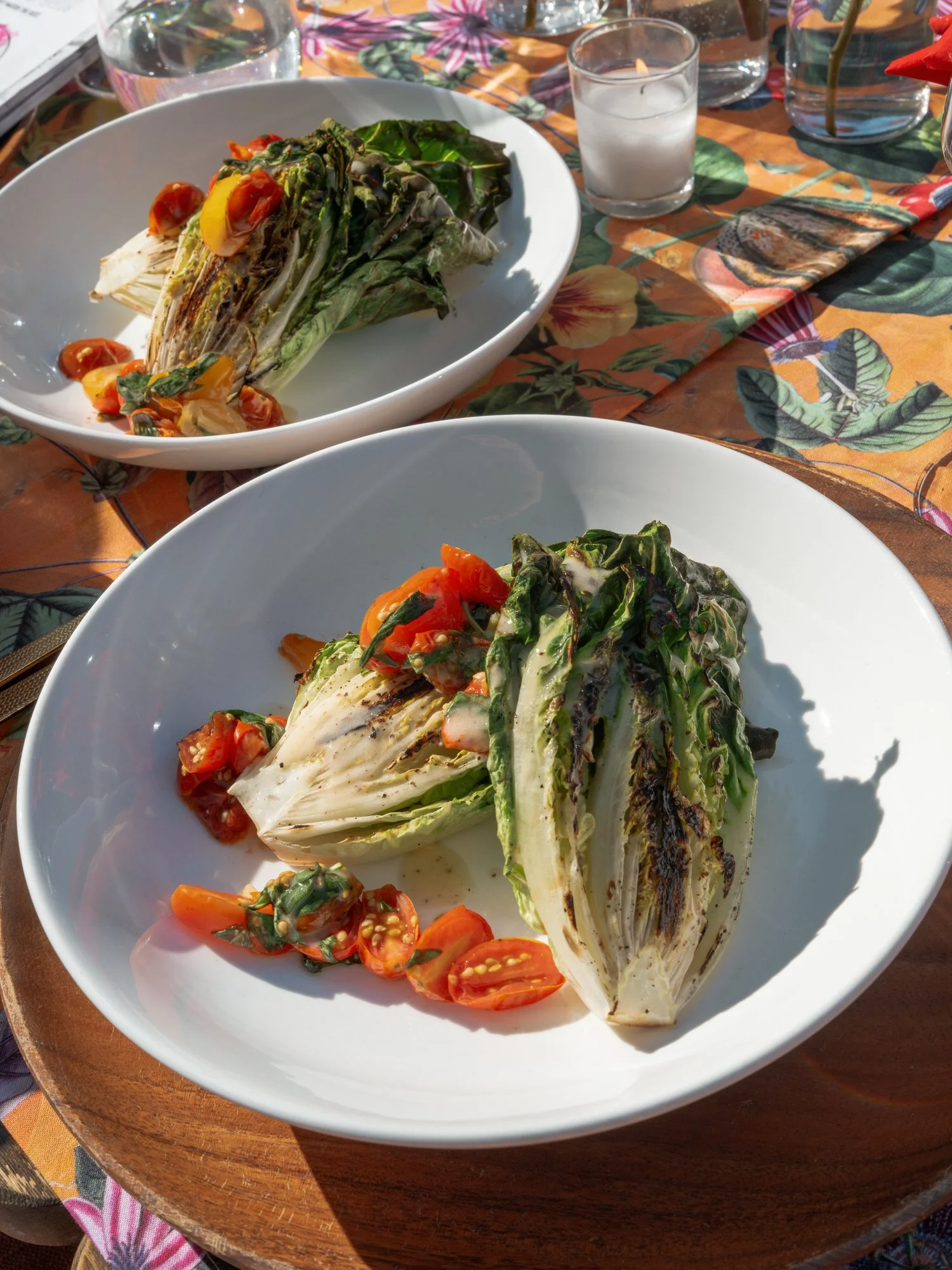 Grilled romaine salad with tomatoes served al fresco at Valley Rock Inn, Sloatsburg, NY, photographed by Jenny Fu.