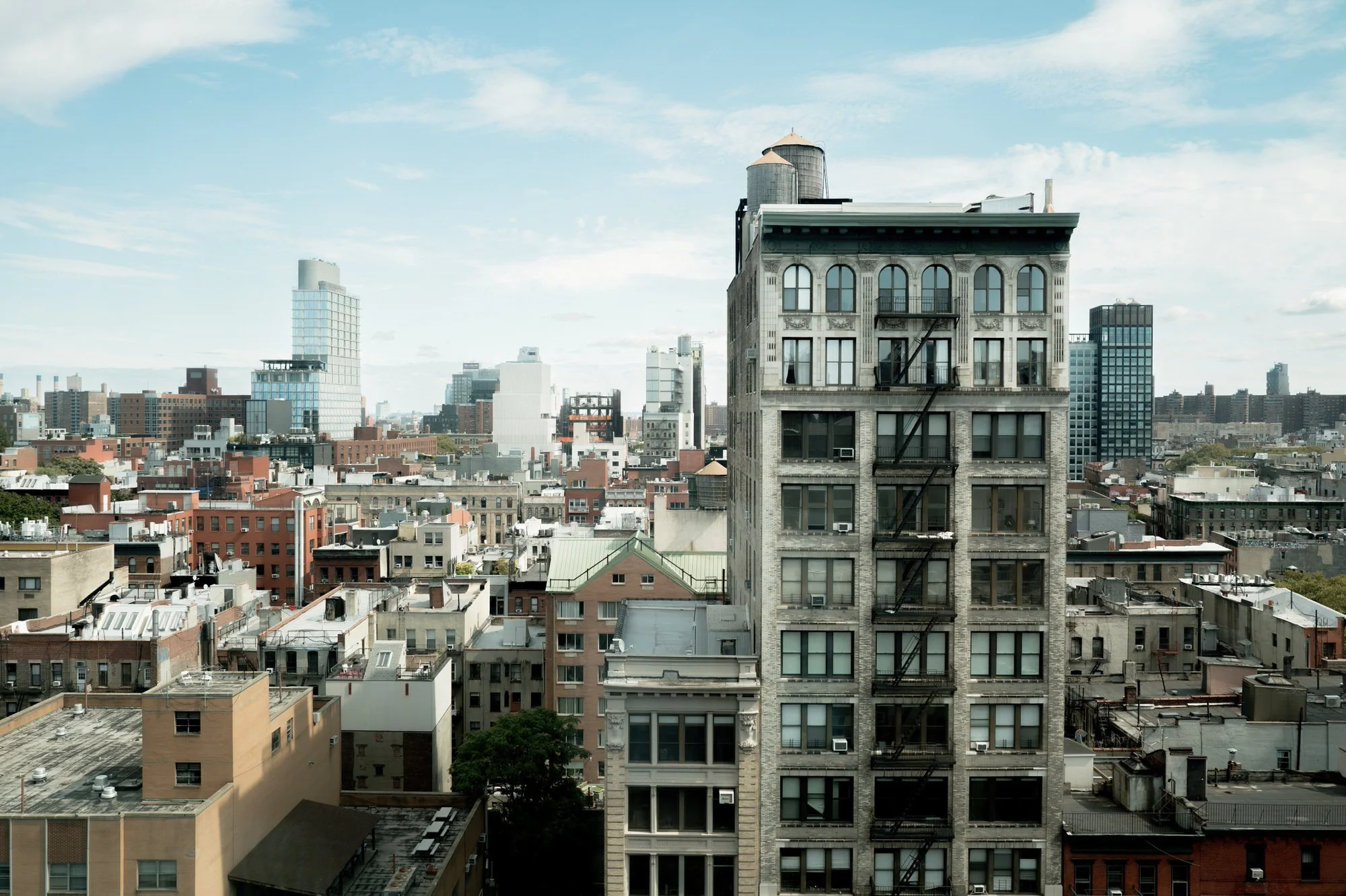Elevated view of downtown Manhattan skyline from the couple’s suite at Crosby Street Hotel in Soho, photographed by Jenny Fu.