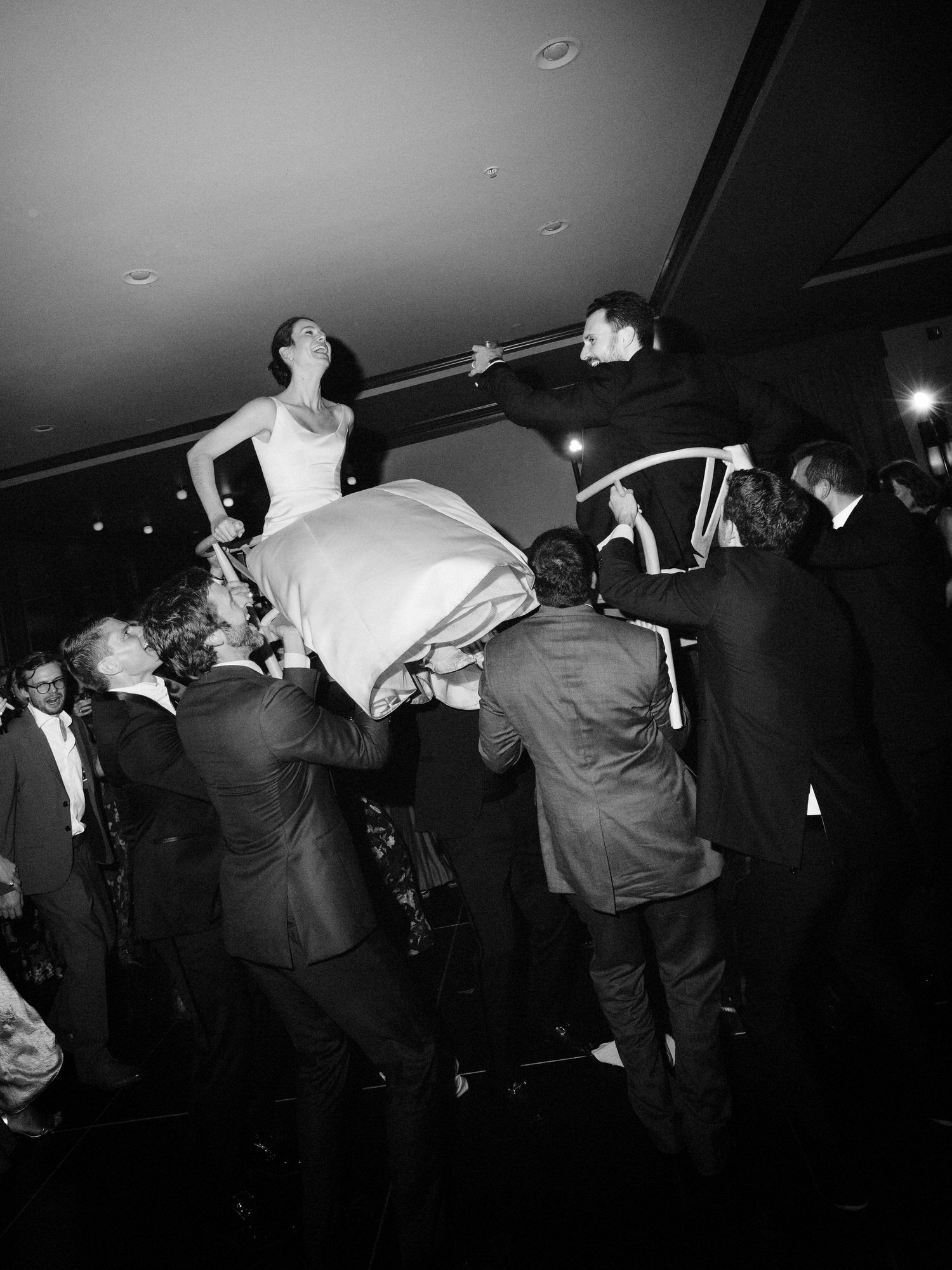 aa-1093-bride-and-groom-lifted-during-hora-dance-troutbeck-amenia-ny-planned-by-ashley-douglass-jenny-fu.jpg