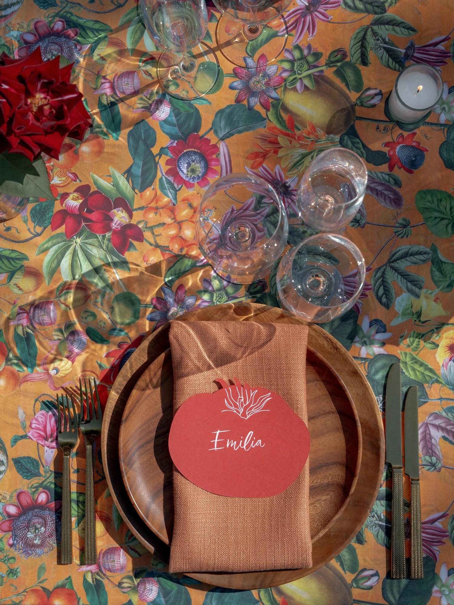 Overhead place setting on floral linen with custom name card at Valley Rock Inn, Sloatsburg, NY, photographed by Jenny Fu.