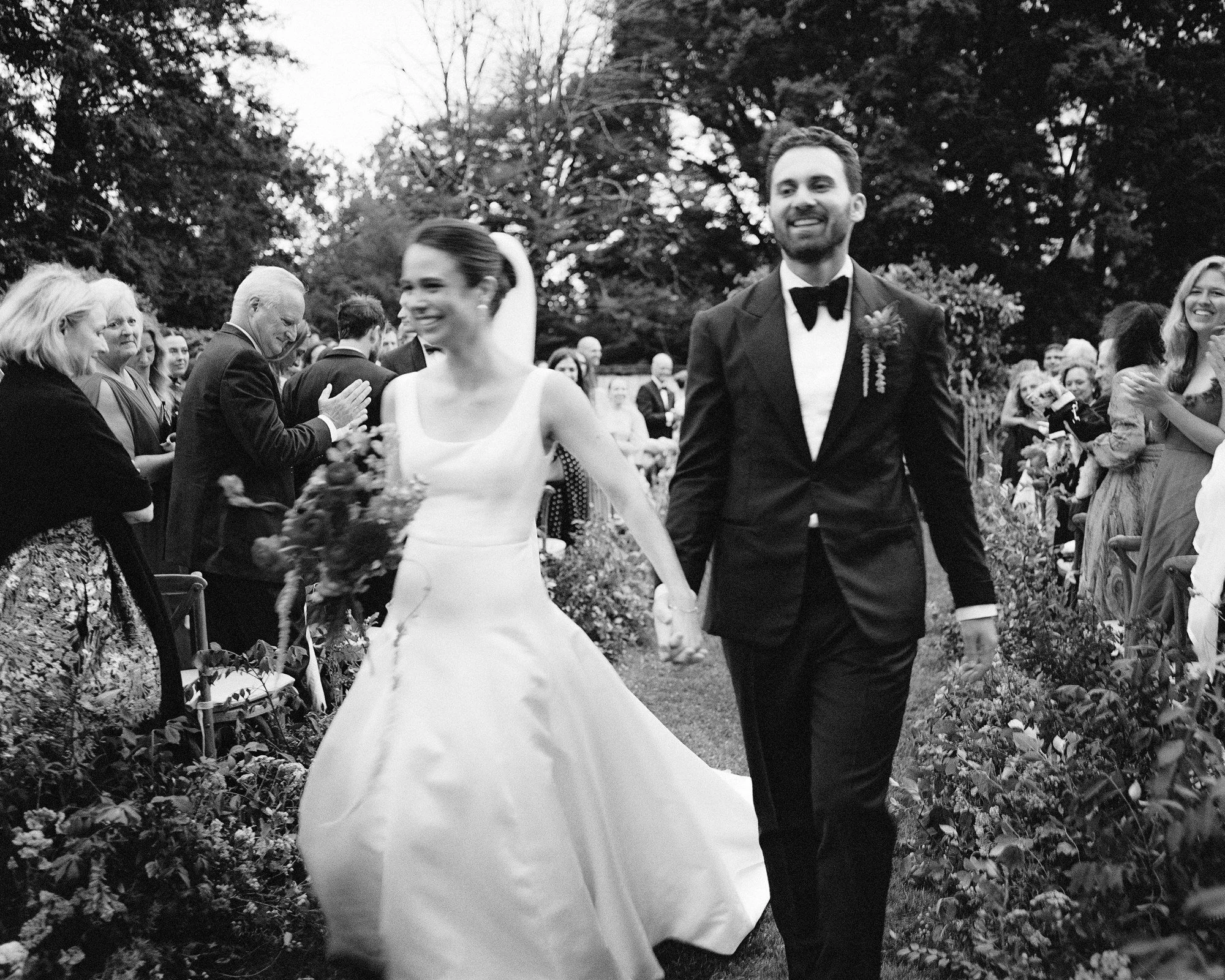 aa-0713-bride-and-groom-walking-up-aisle-smiling-troutbeck-amenia-ny-planned-by-ashley-douglass-jenny-fu.jpg