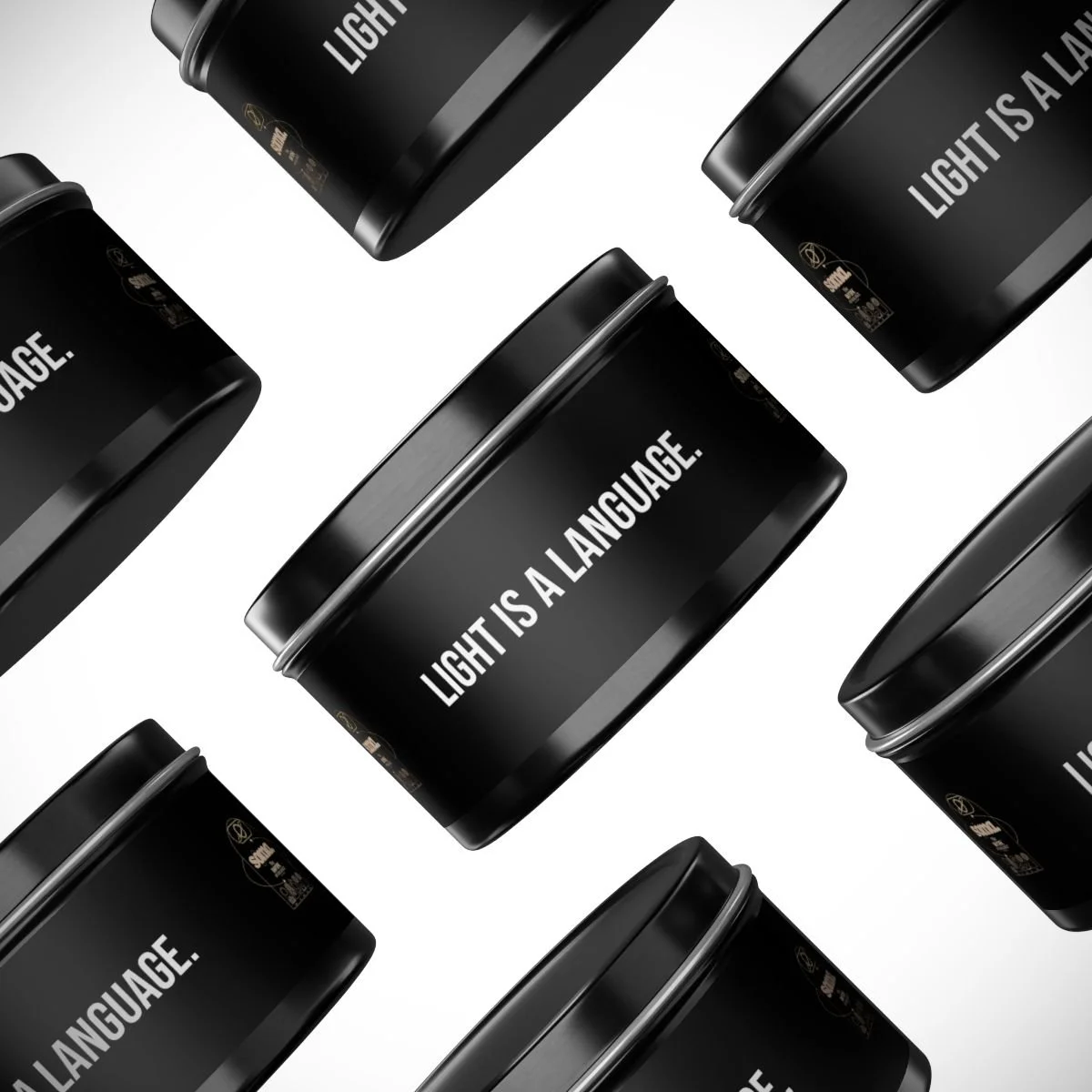 Pattern of black cans with the phrase "Light is a language" in white, arranged diagonally on a white background.