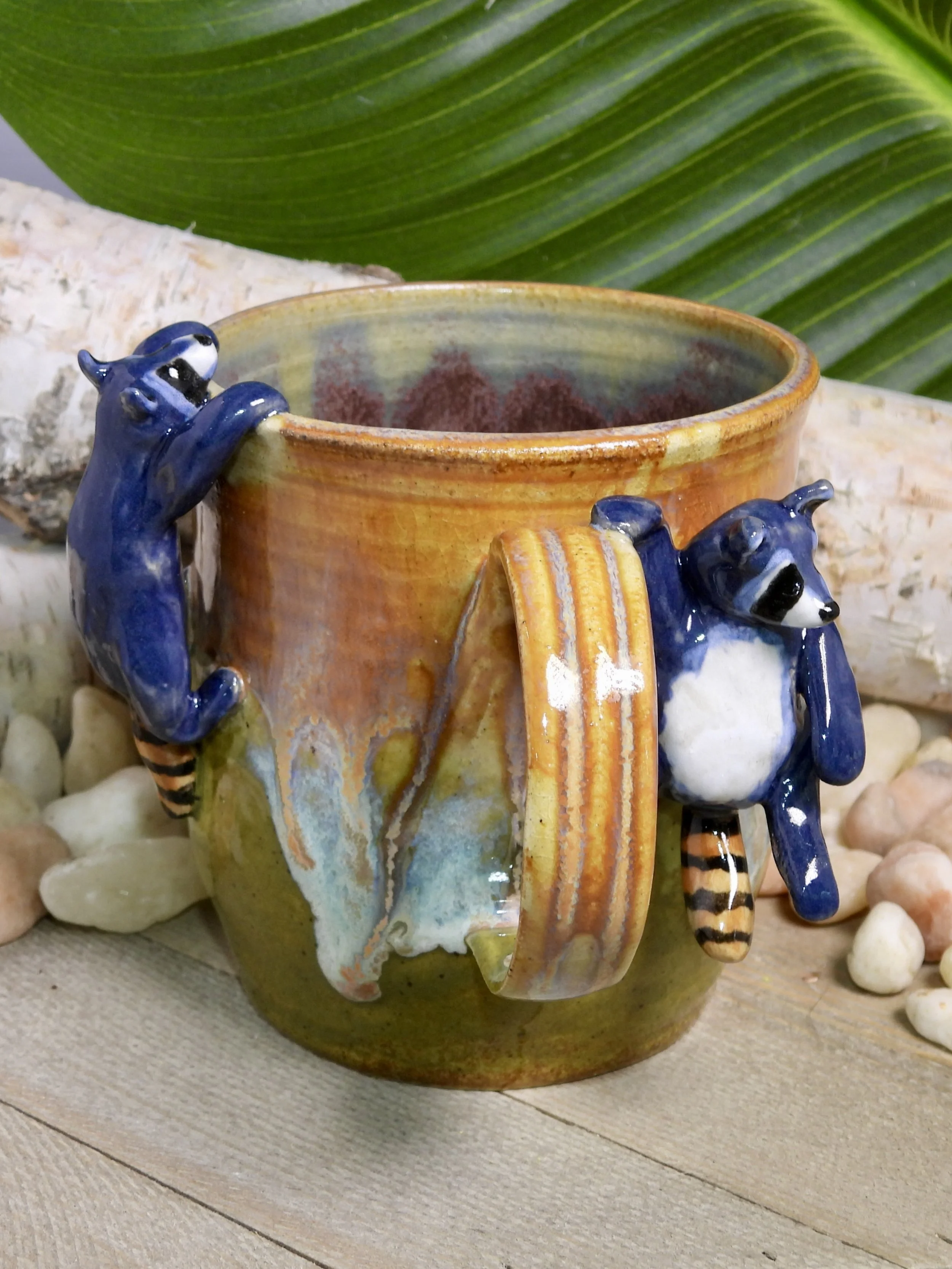 Hanging Mischievous Raccoons Ceramic Mug