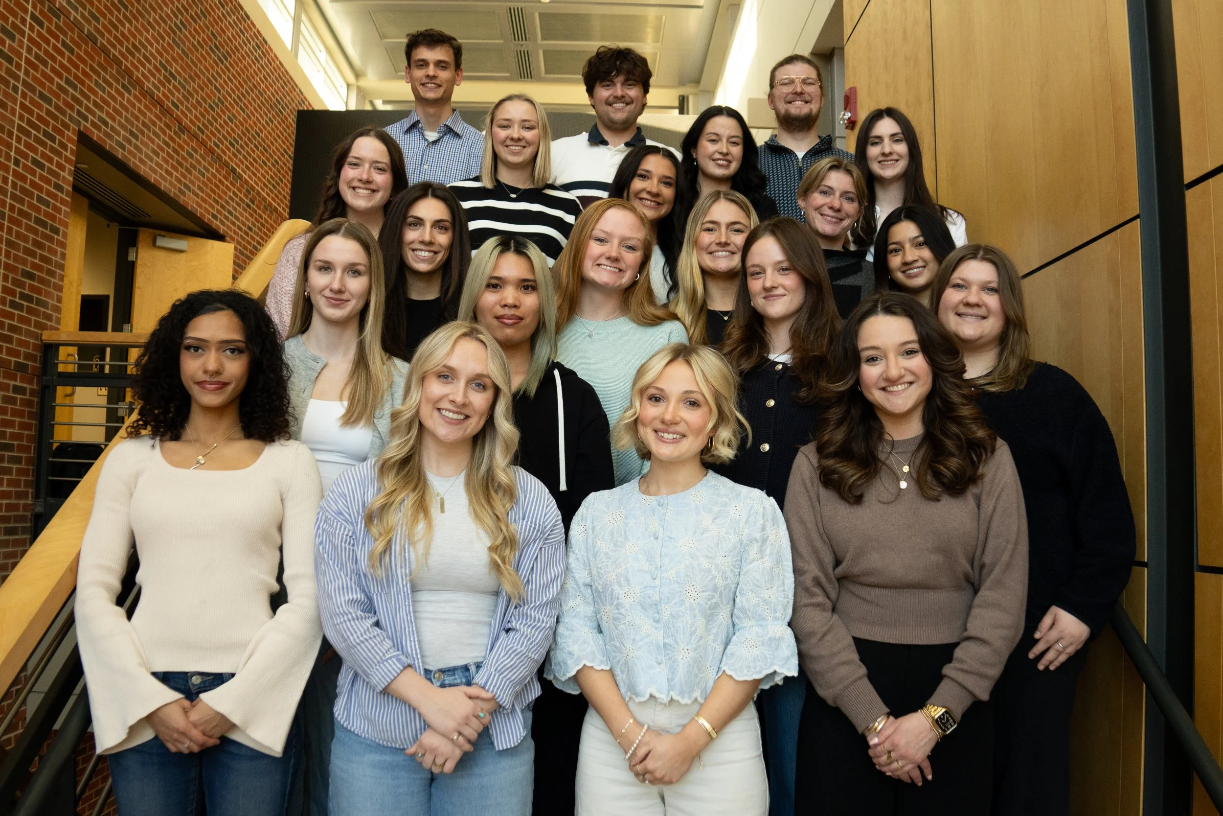 Group photo of team members of the Adler Agency